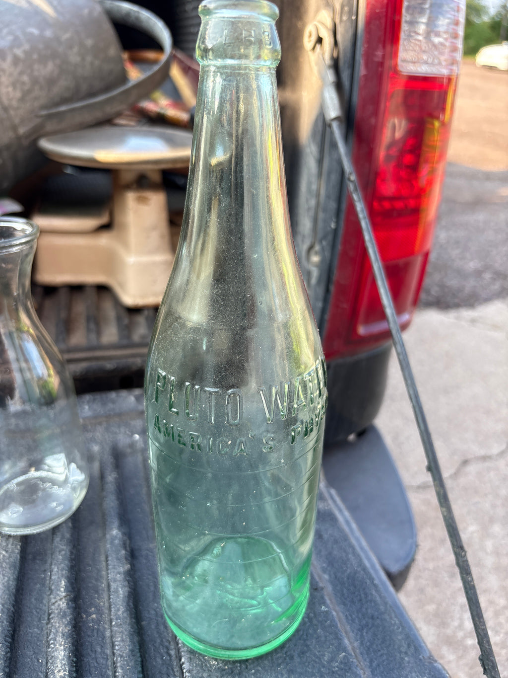 Assorted Glass Bottles and Stoppers