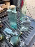 Assorted Glass Bottles and Stoppers