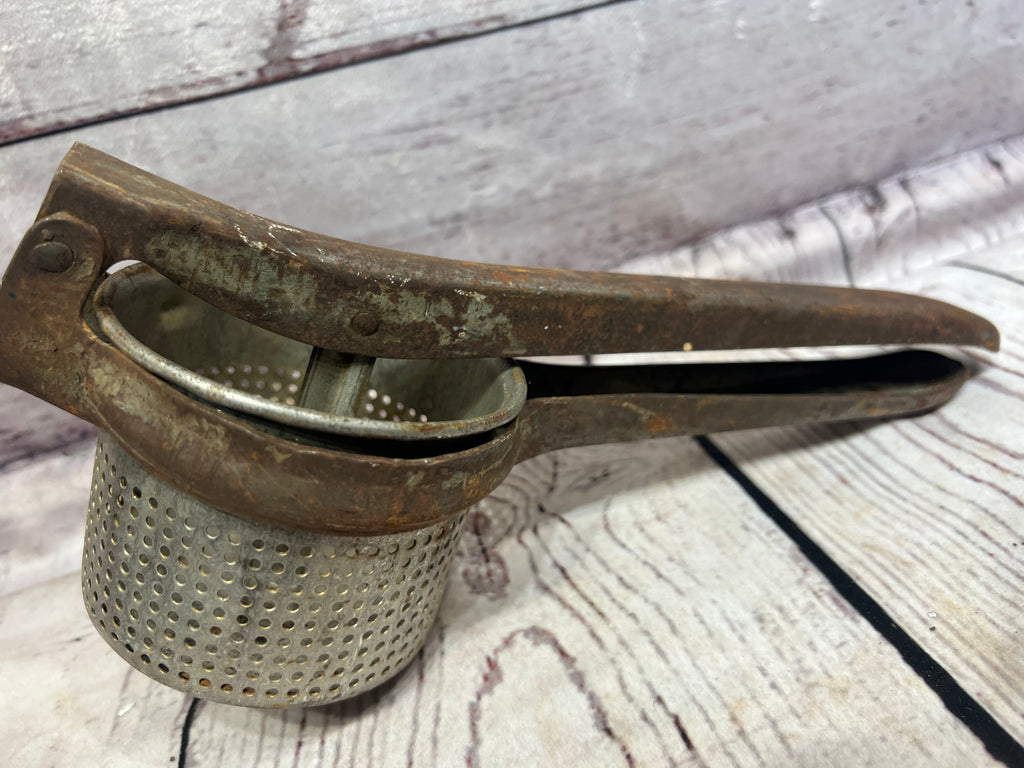 Vintage bean/potato masher