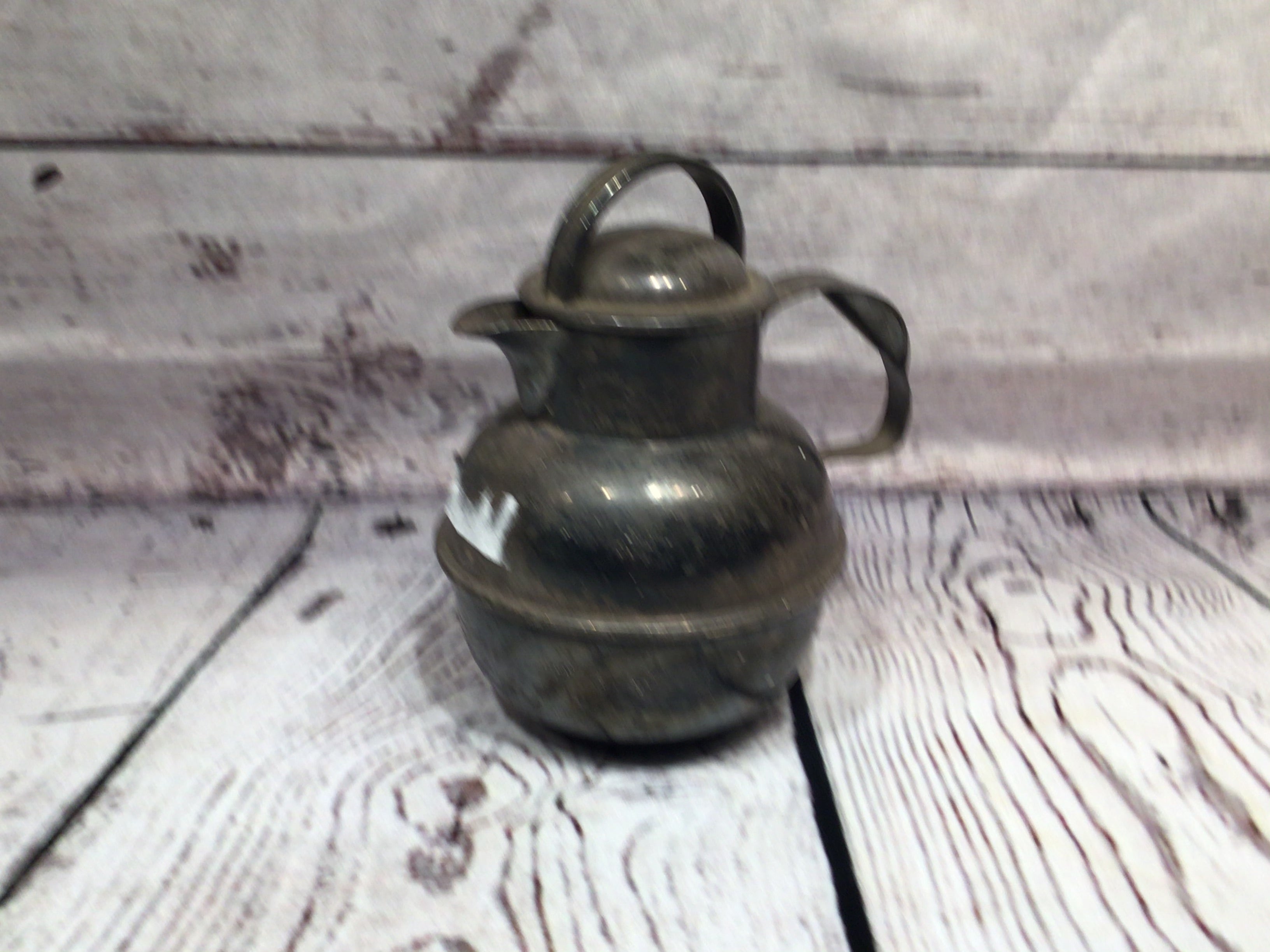 Sterling silver tea pitcher