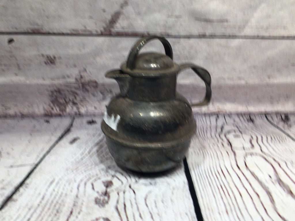 Sterling silver tea pitcher