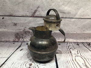 Sterling silver tea pitcher