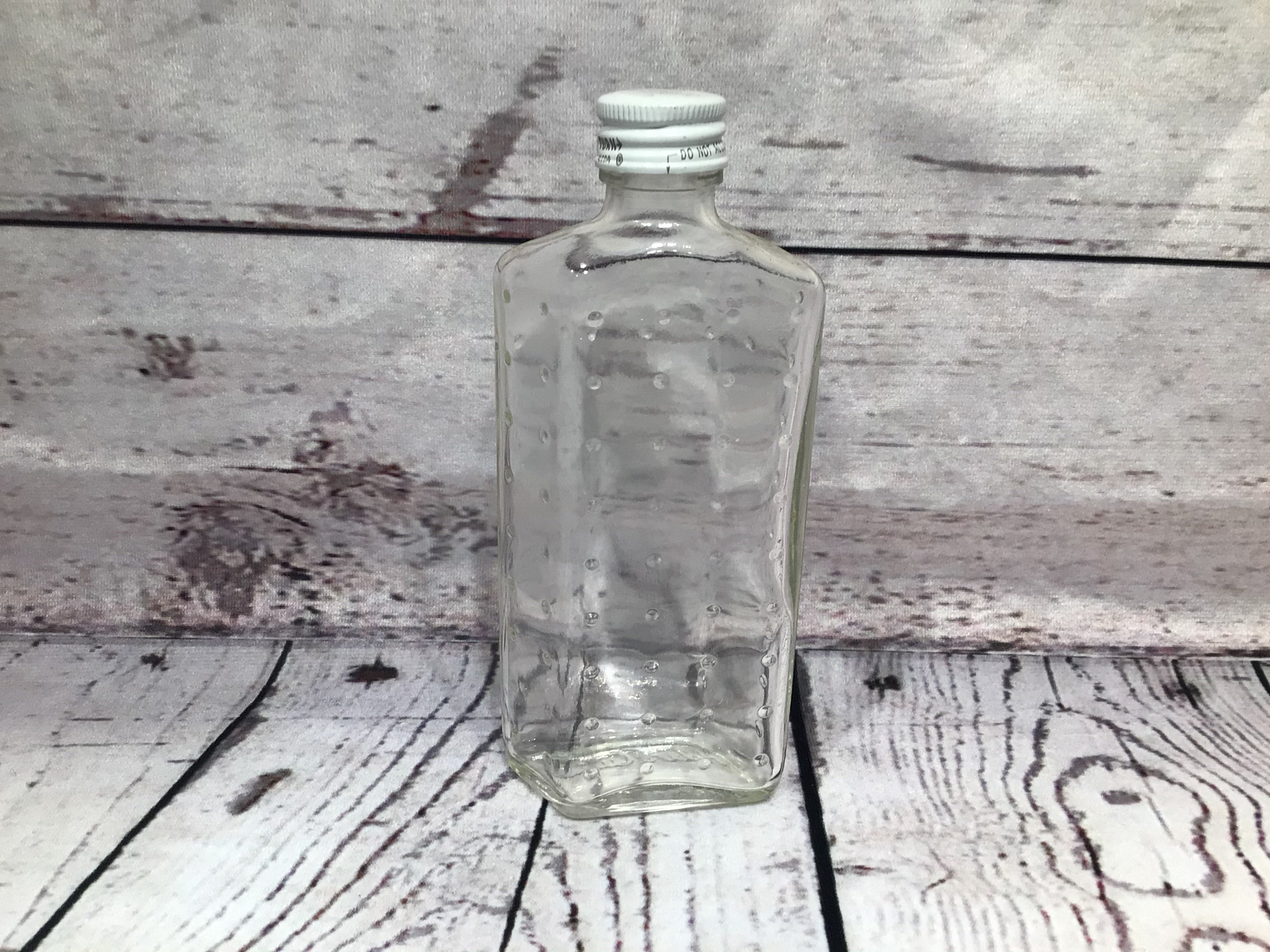 Helen Curtis glass bottle