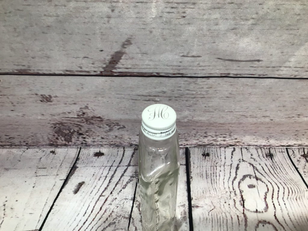 Helen Curtis glass bottle