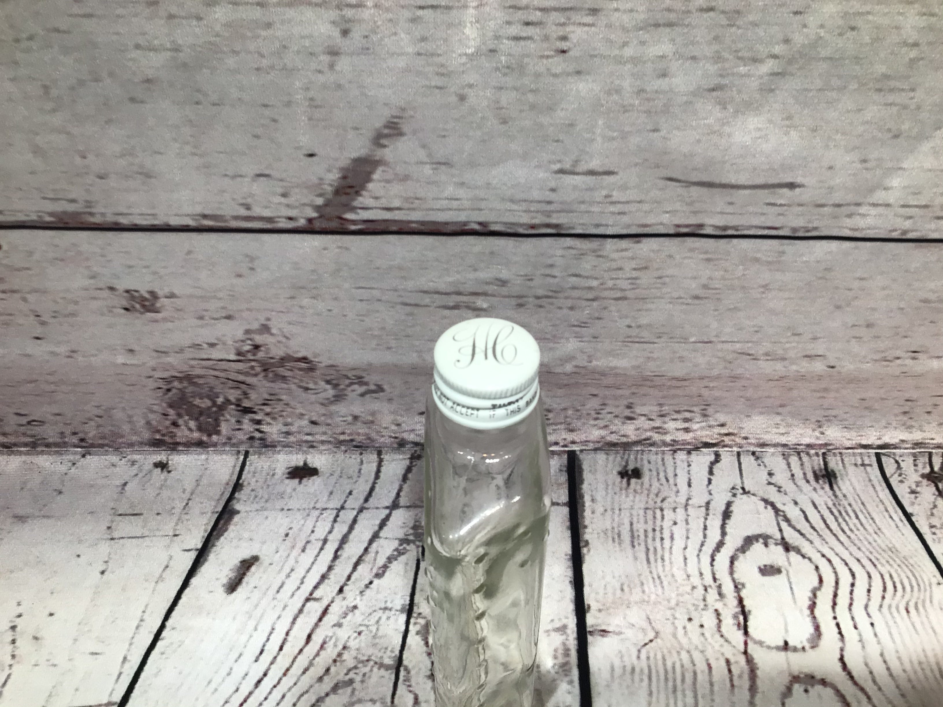 Helen Curtis glass bottle