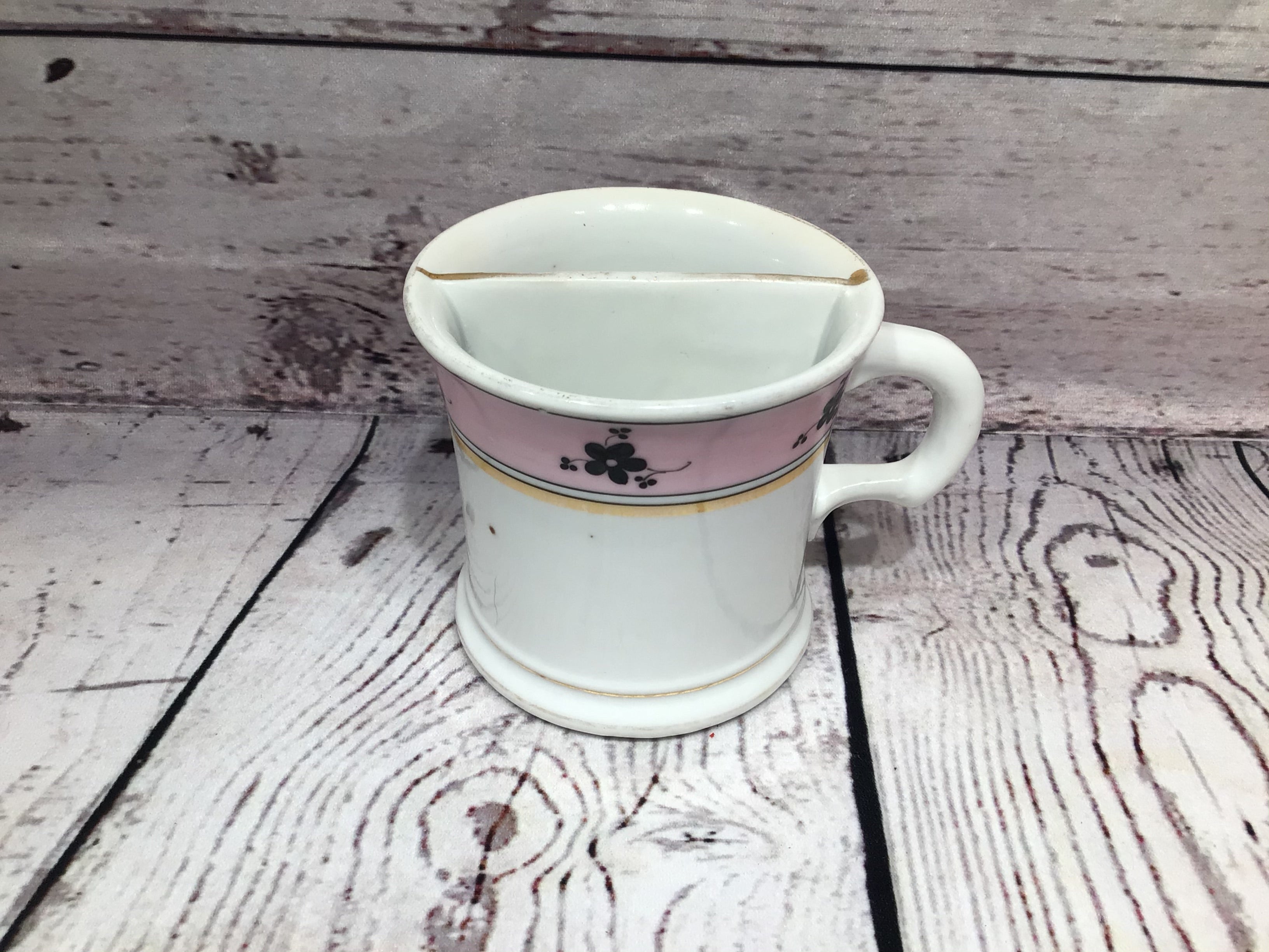 Cup with divider purple strip on top