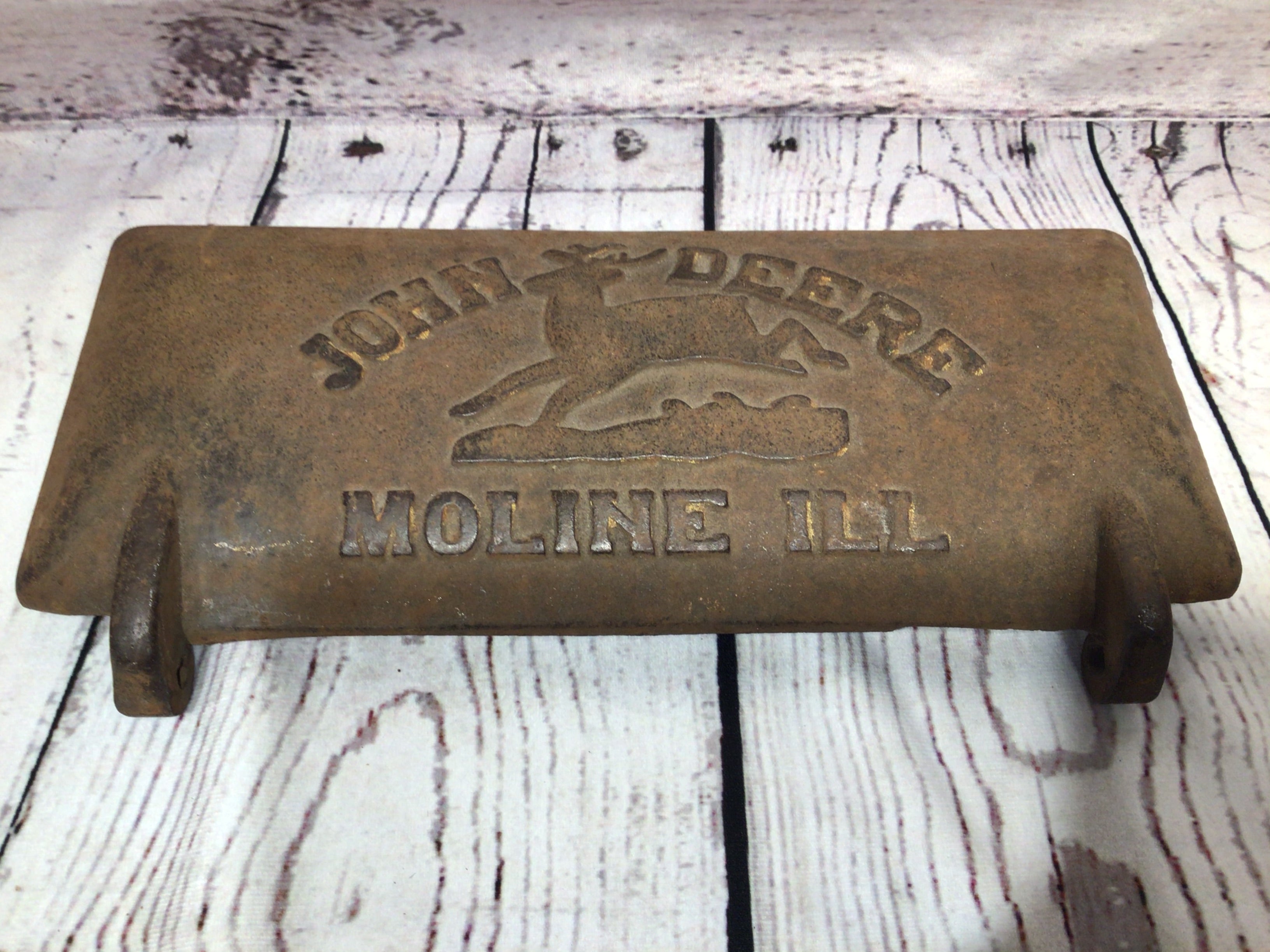 John Deer cast iron plate