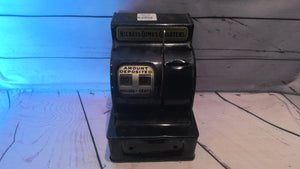 Black metal cash register toy