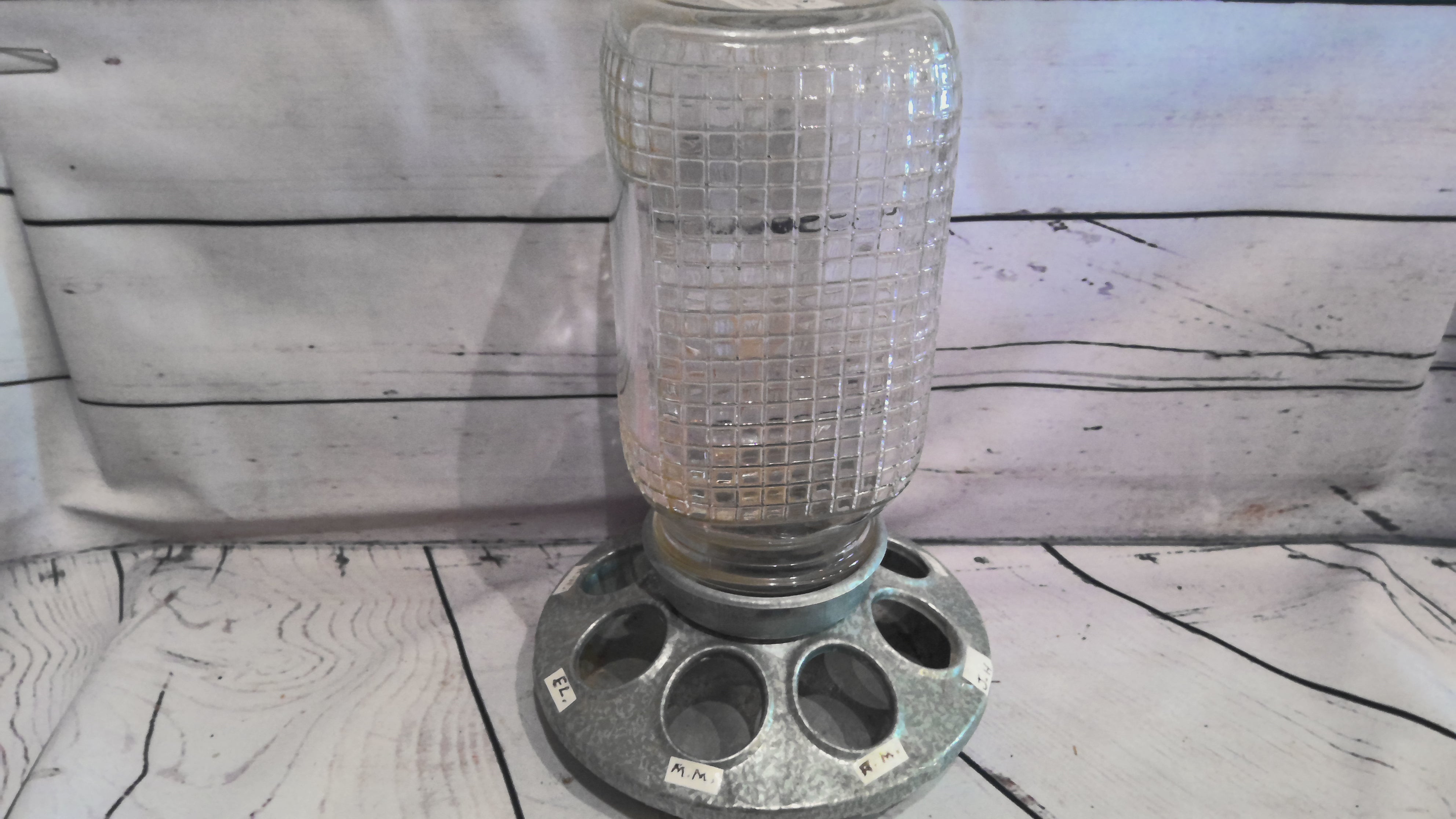 Vintage ball jar with chicken feeder