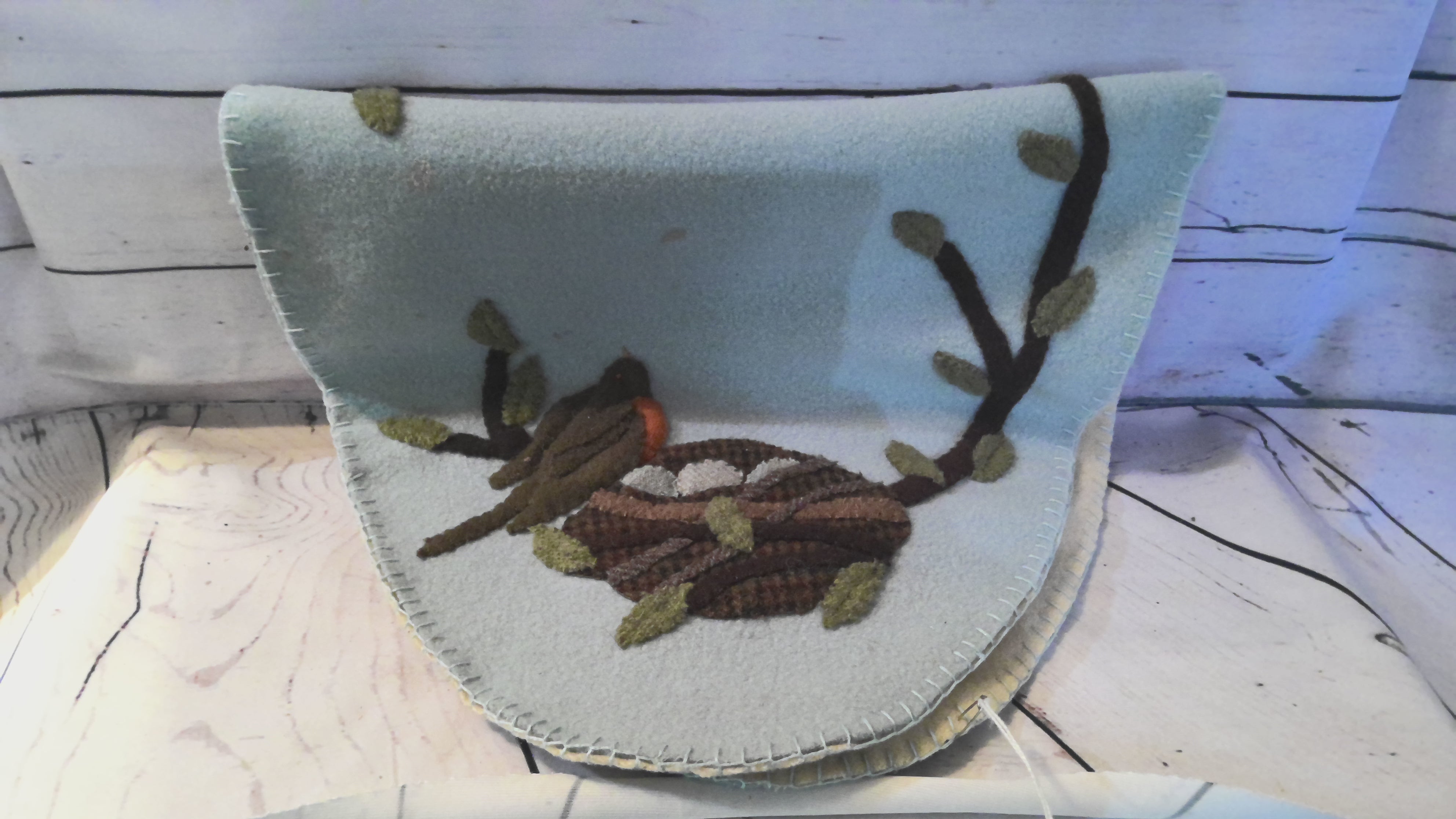 Handknitted Oval Robins nest table mat