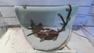 Handknitted Oval Robins nest table mat
