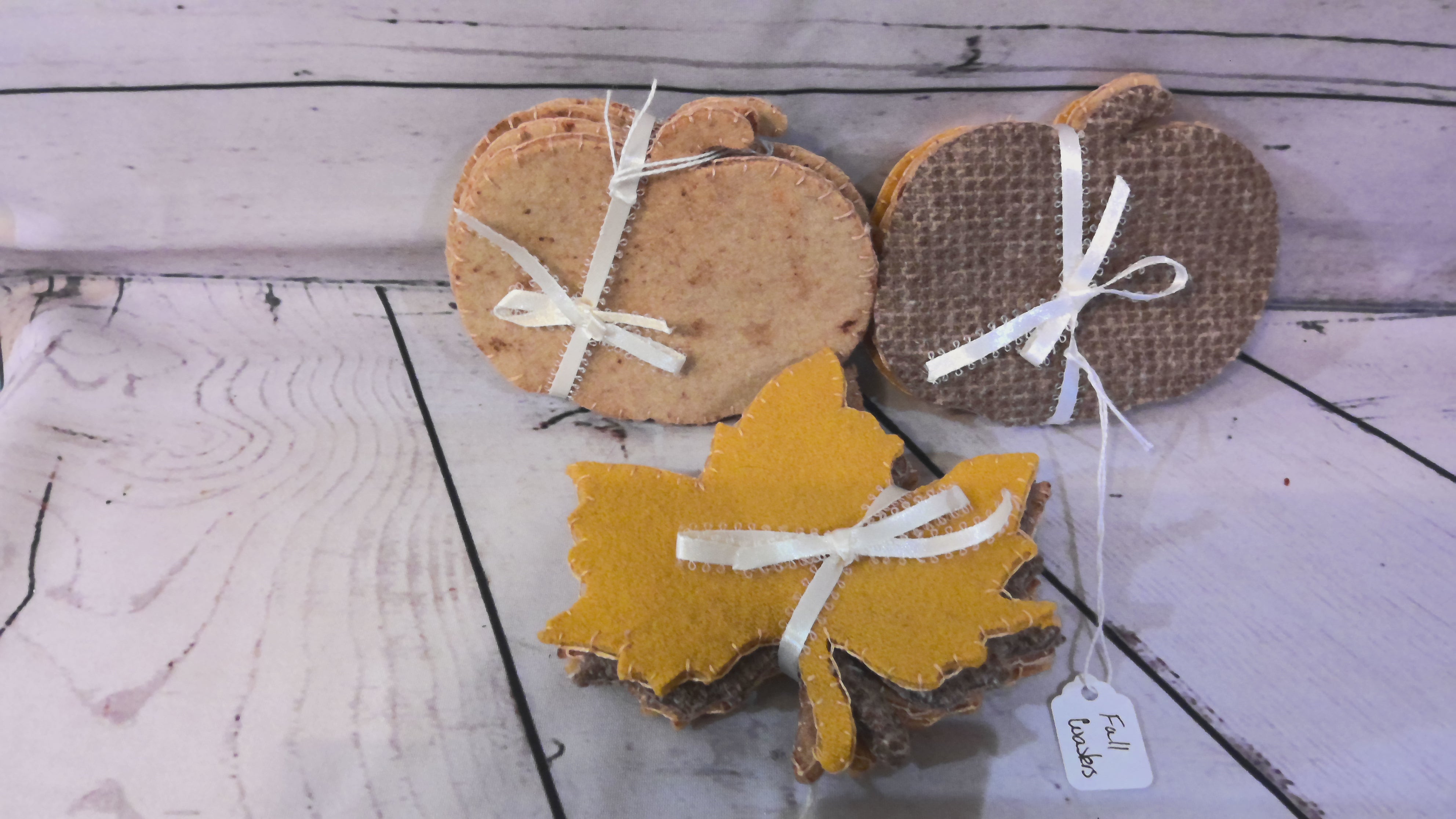Set a four crocheted coasters with fall coasters