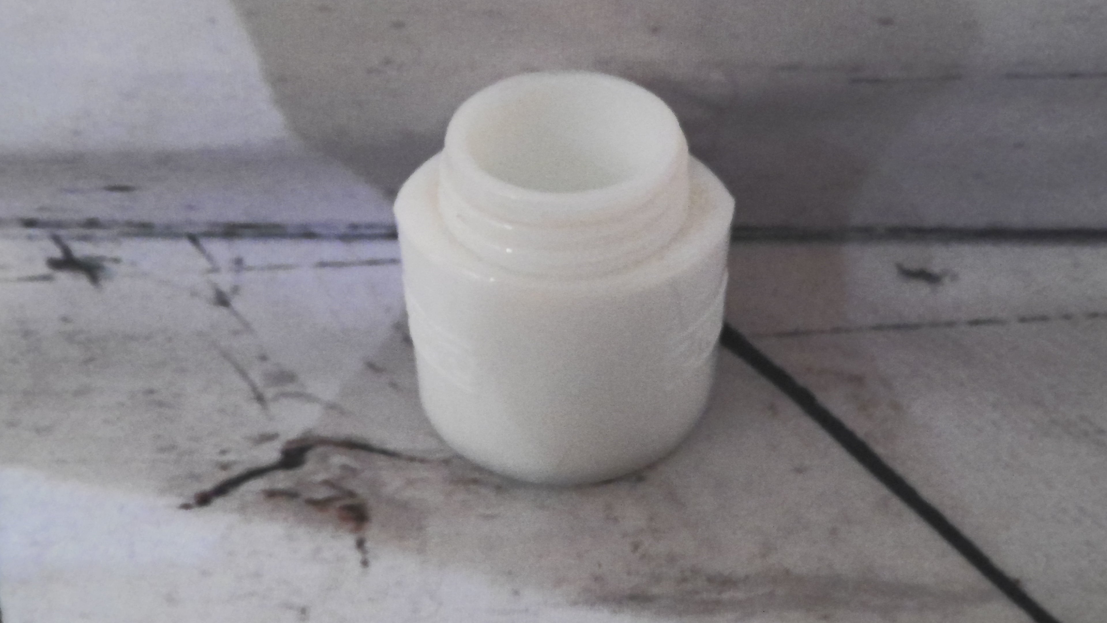 Small milk glass jar
