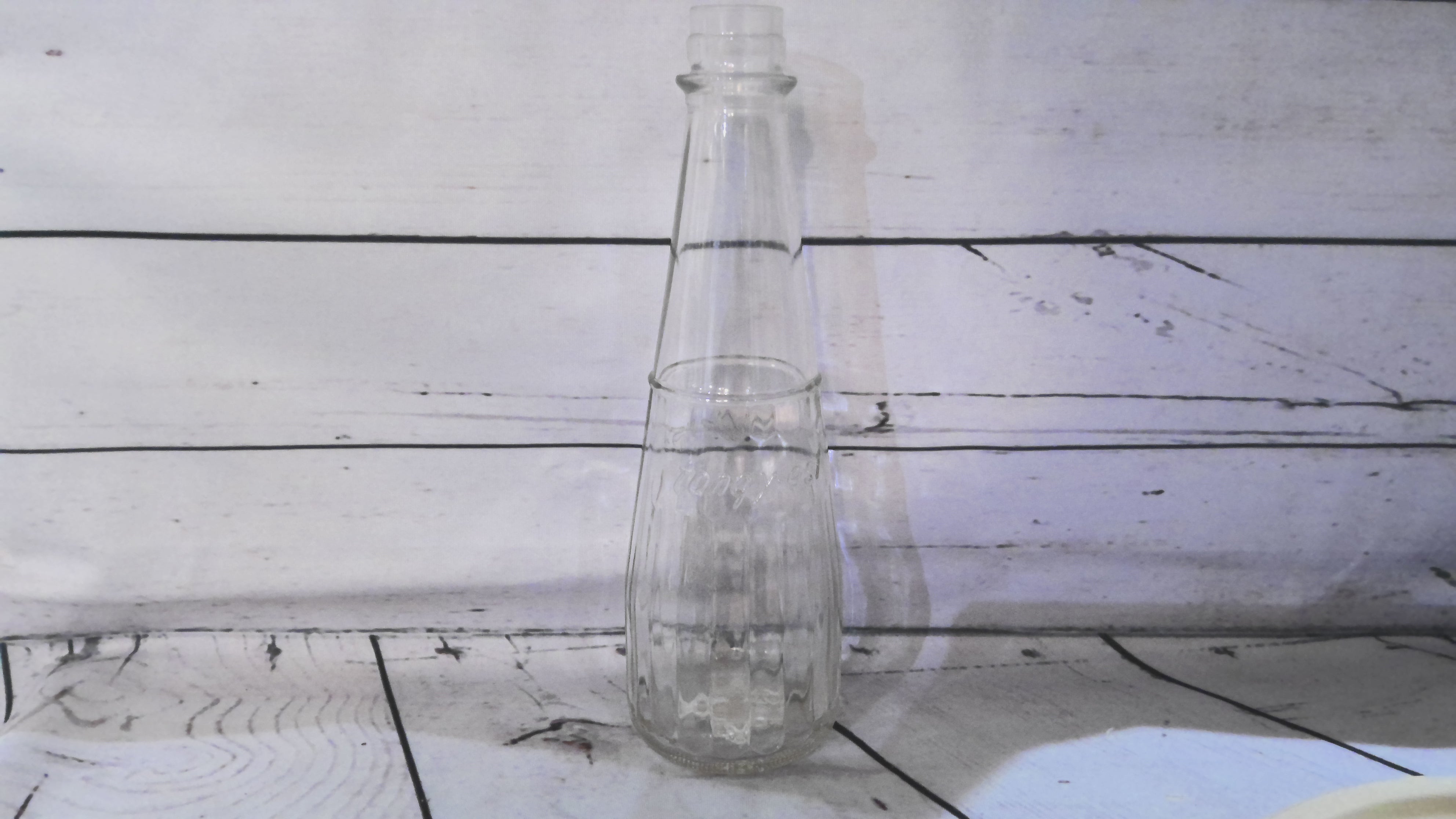 Vintage Tang-est glass bottle