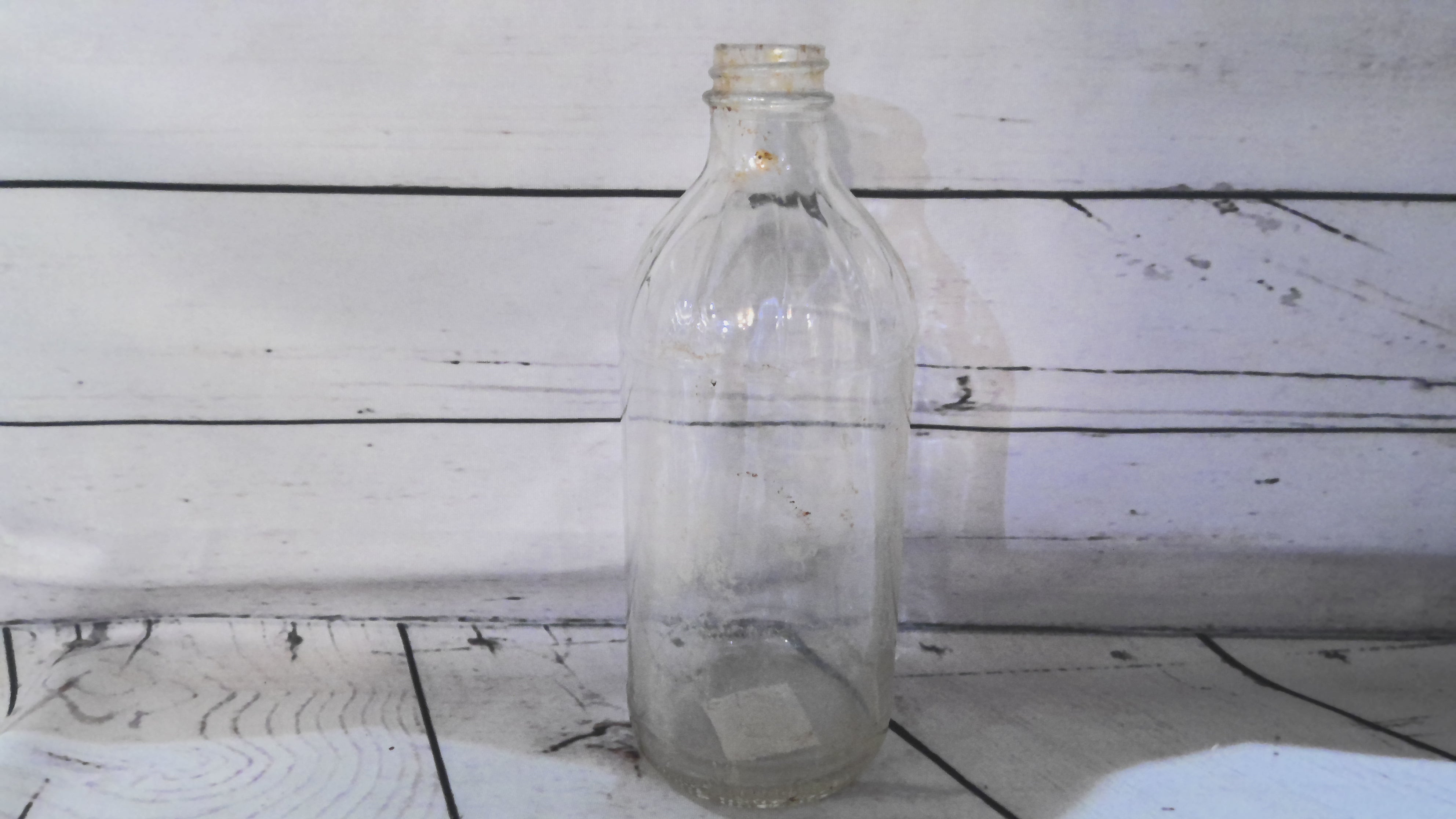 Large glass bottle