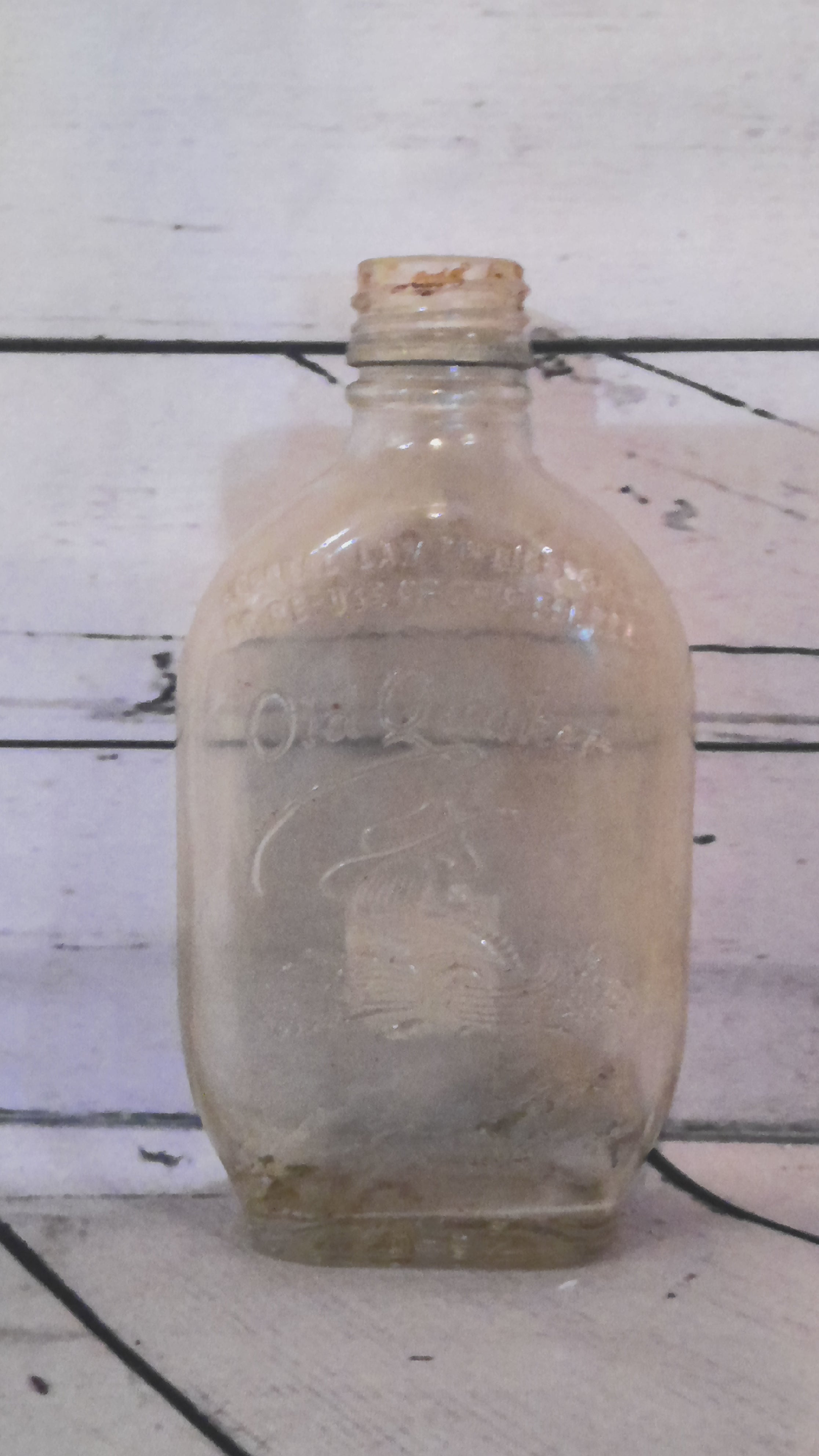 Old Quaker Oat glass bottle