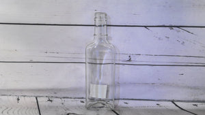 Small glass bottle