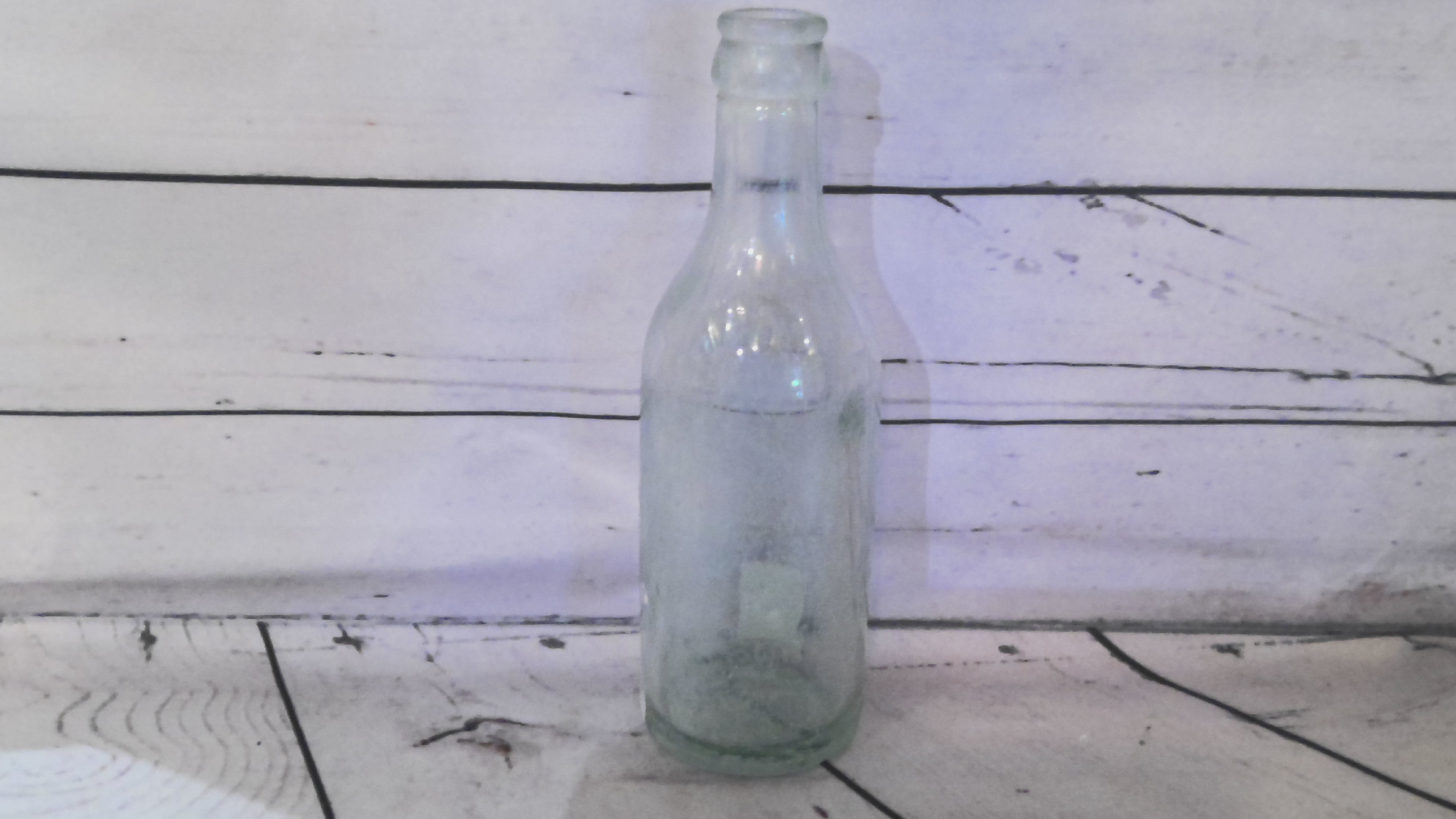 Glass soda bottle