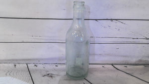 Glass soda bottle