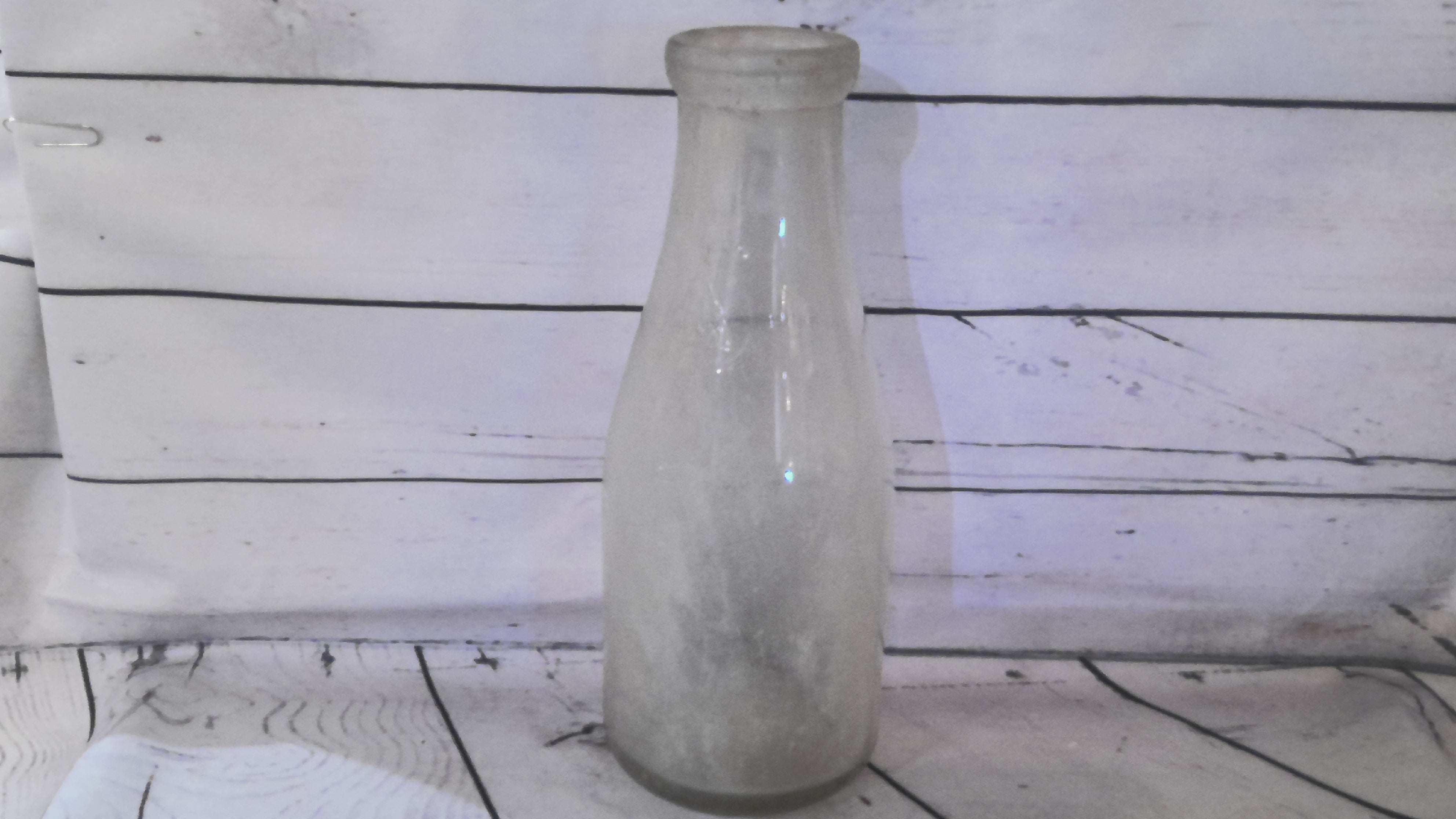 Large glass milk bottle