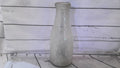 Large glass milk bottle