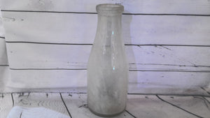 Large glass milk bottle