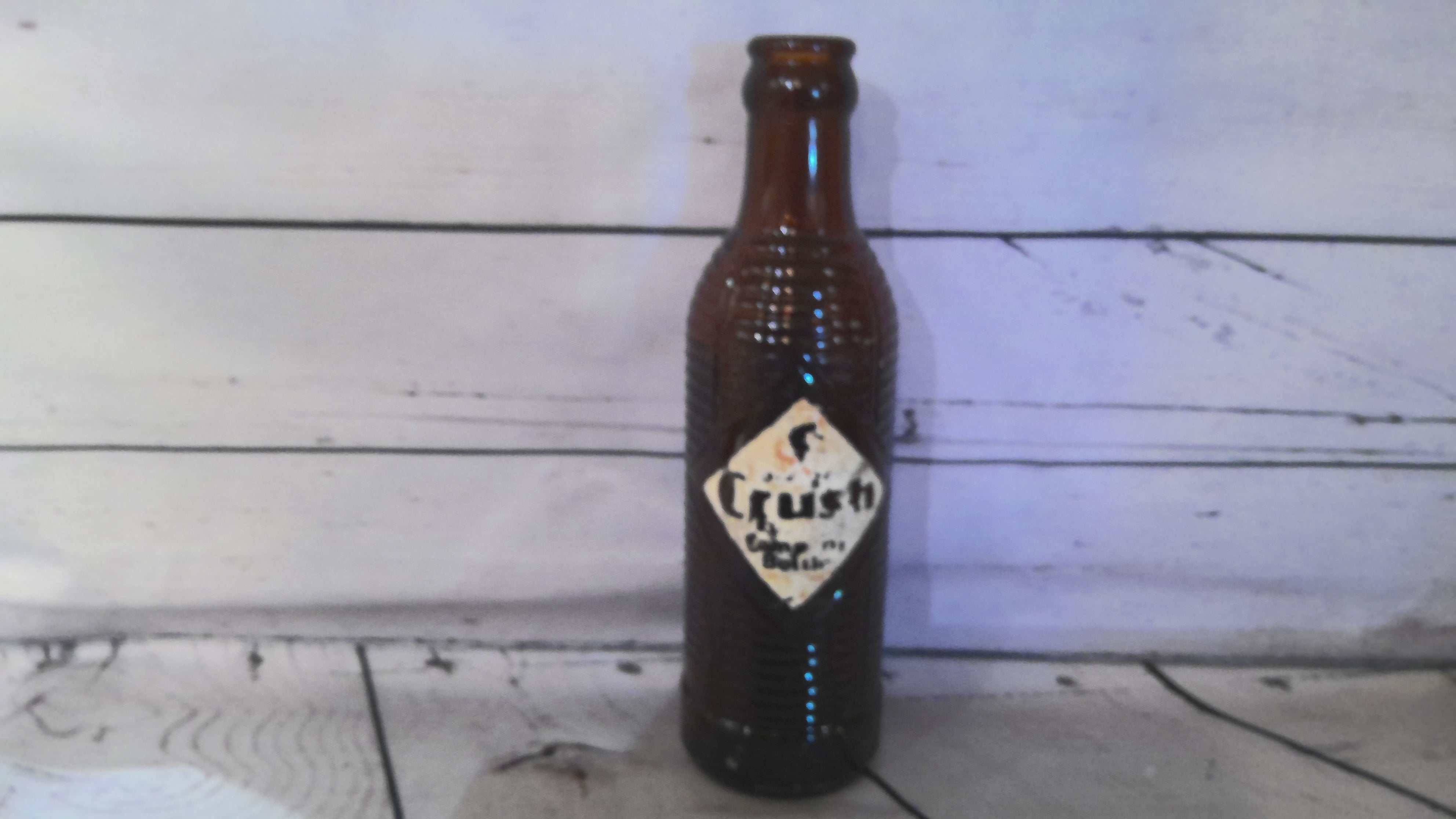Vintage brown crush orange soda bottle