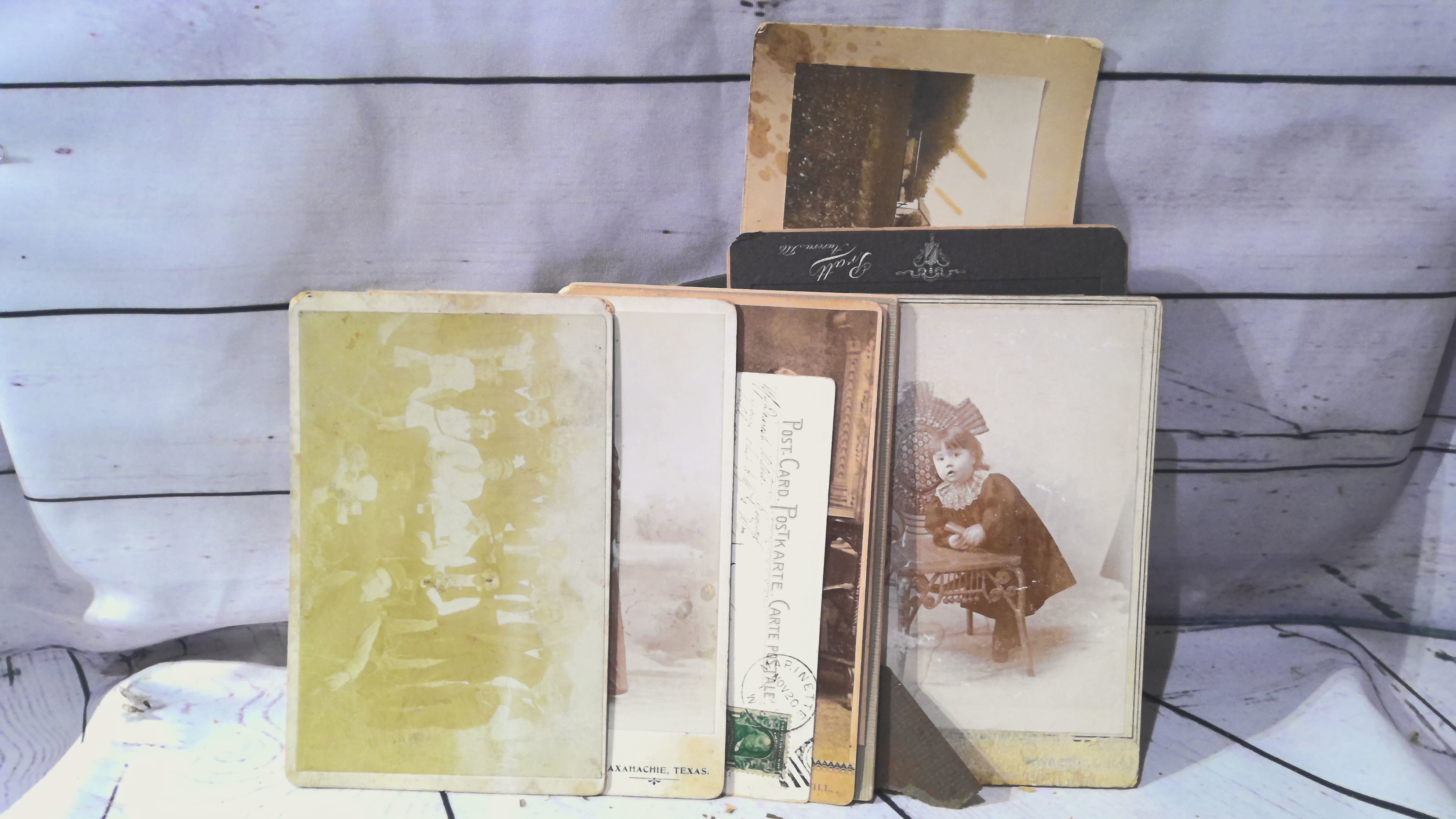 Assortment of old photos and postcards
