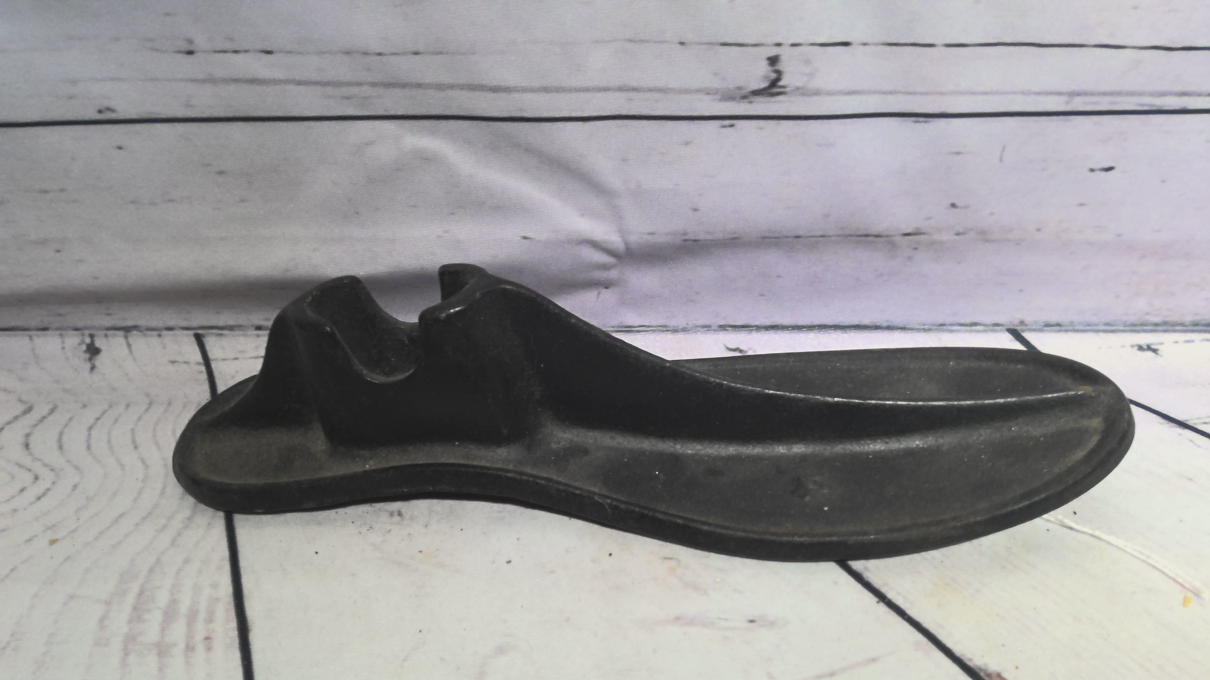 Small and Large cast iron shoe molds