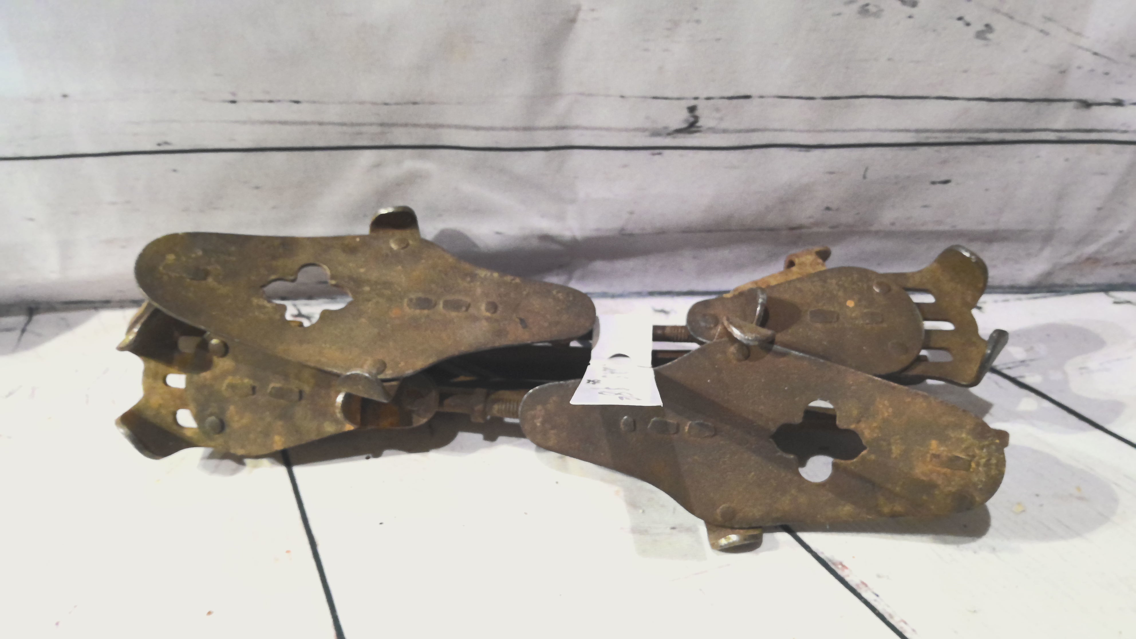 Antique metal ice skates (set)