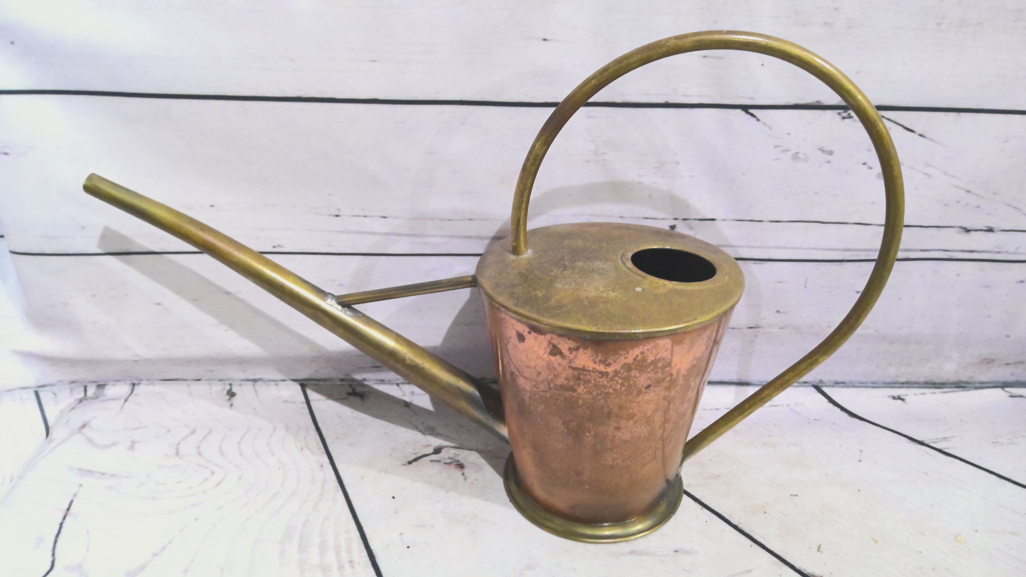 Brass watering can