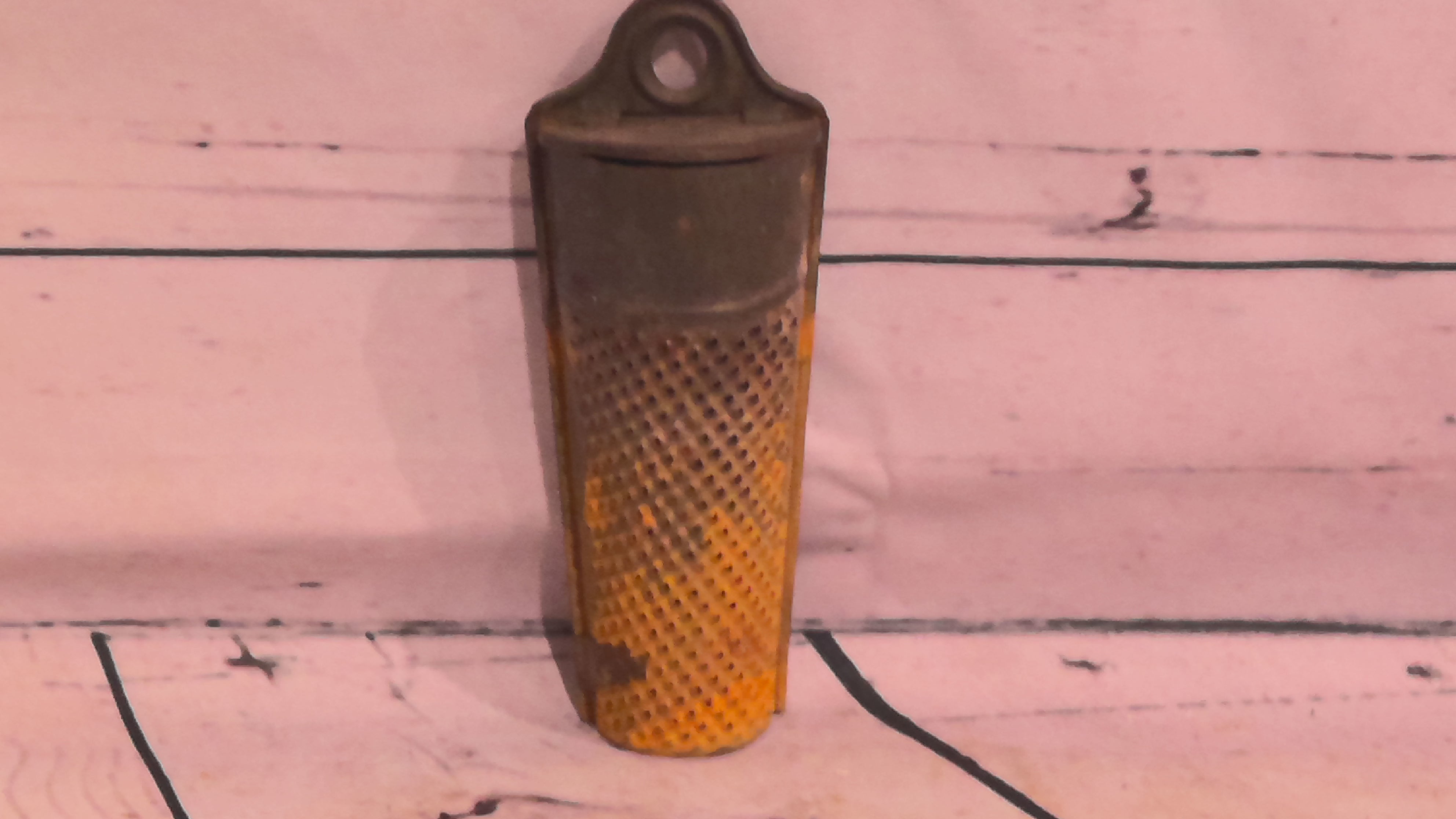 Vintage metal grater with flip lid