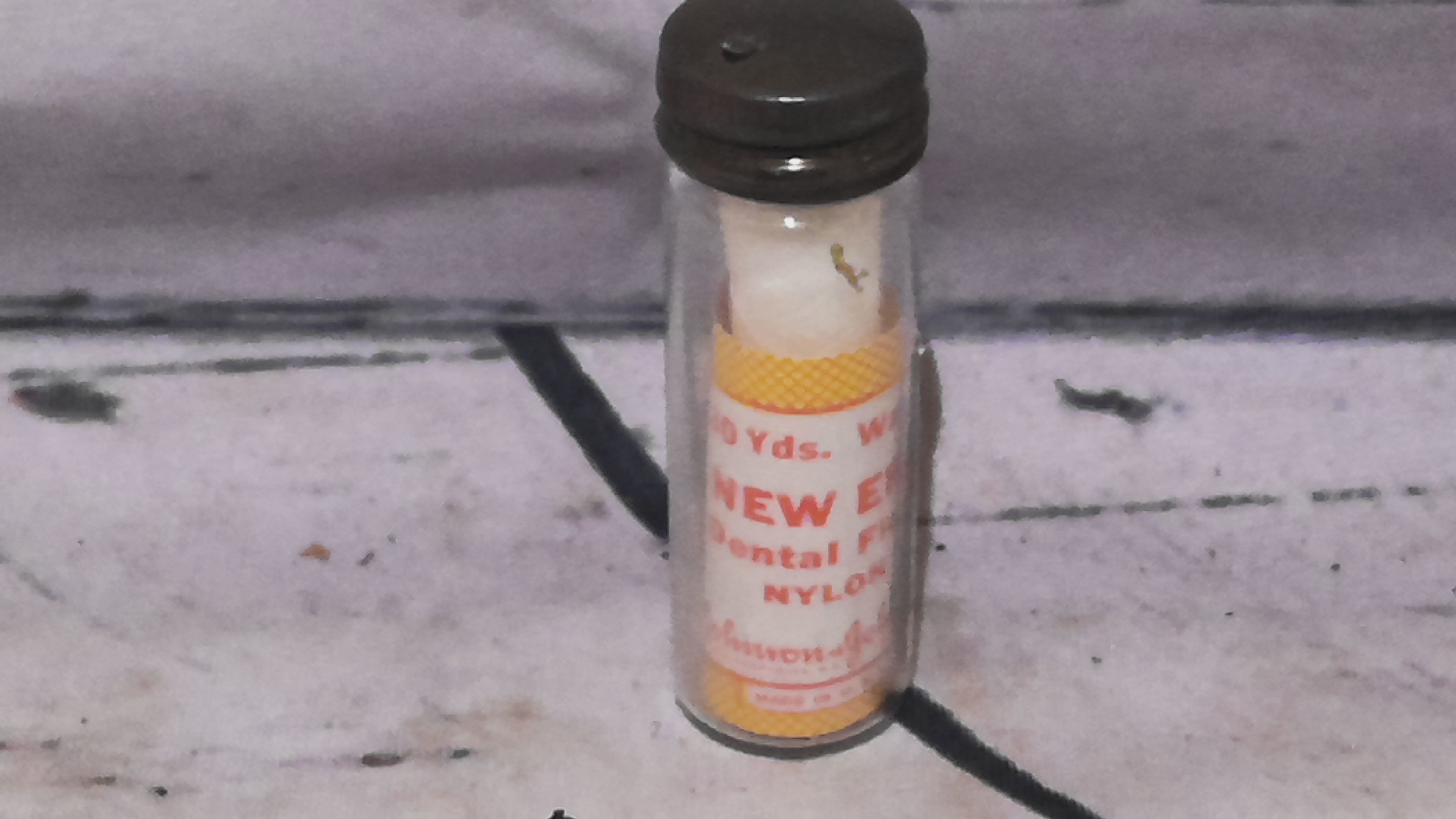 Antique dental floss