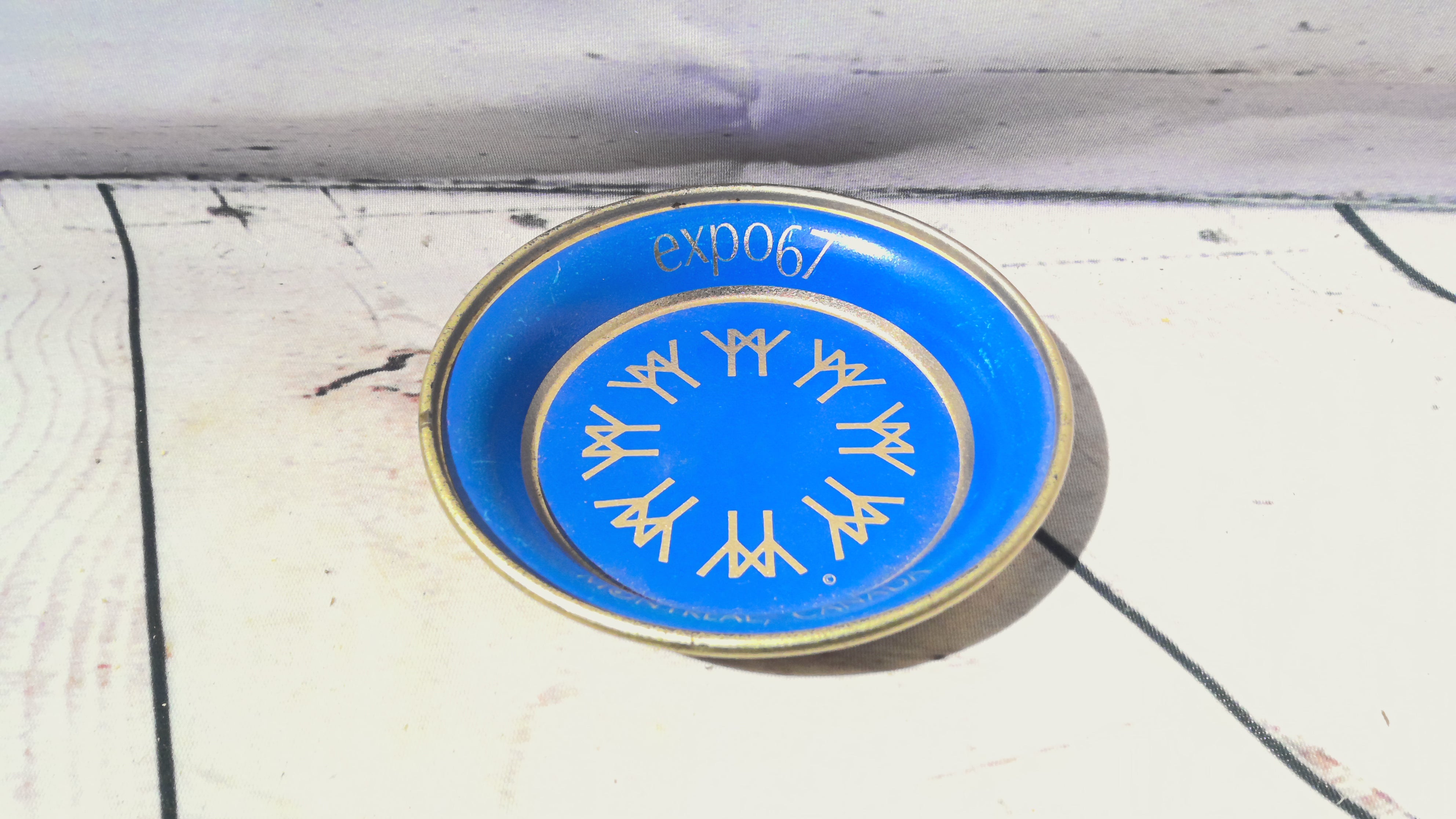 Metal plate and glass ashtray