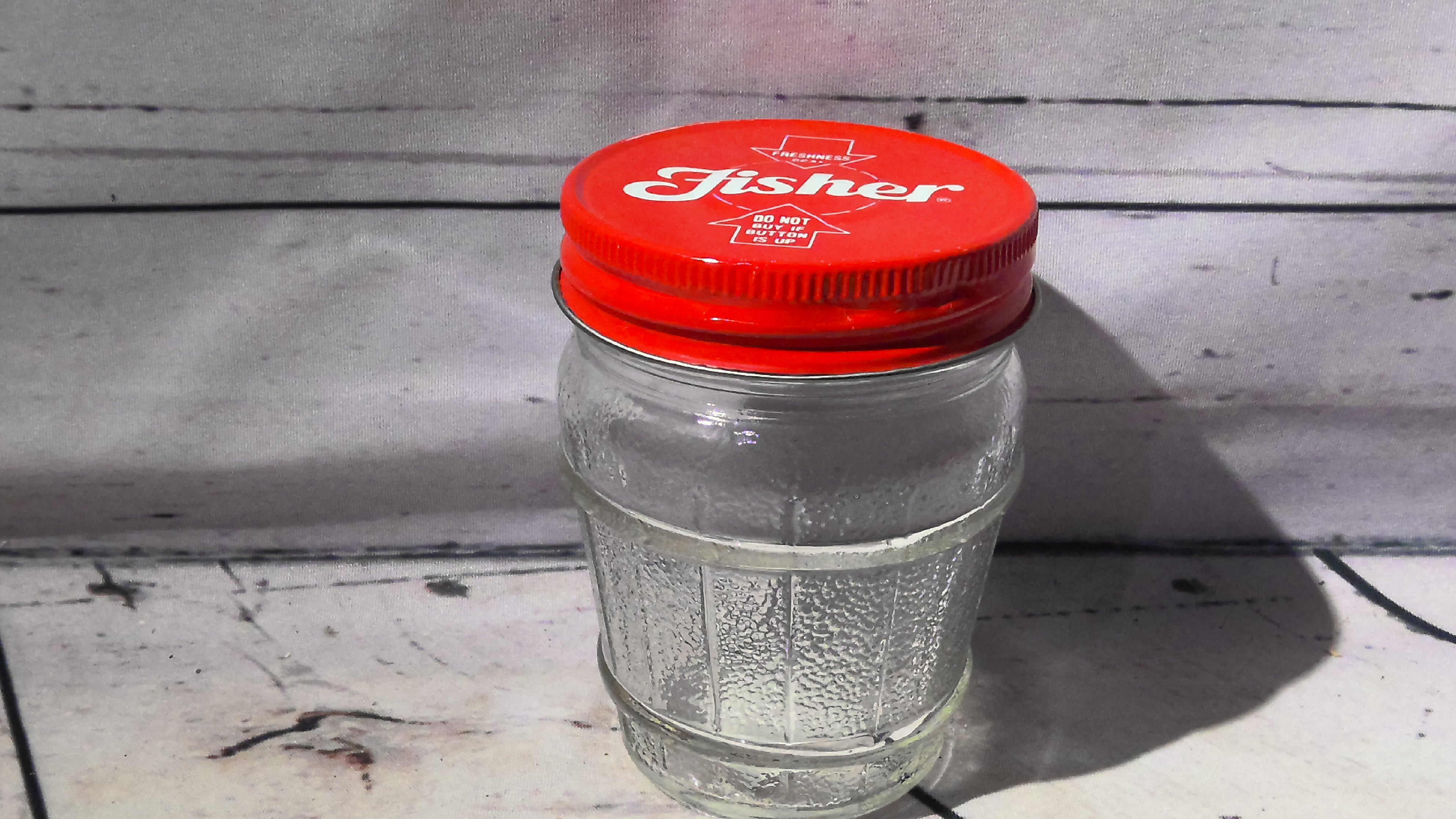 Fisher glass jar