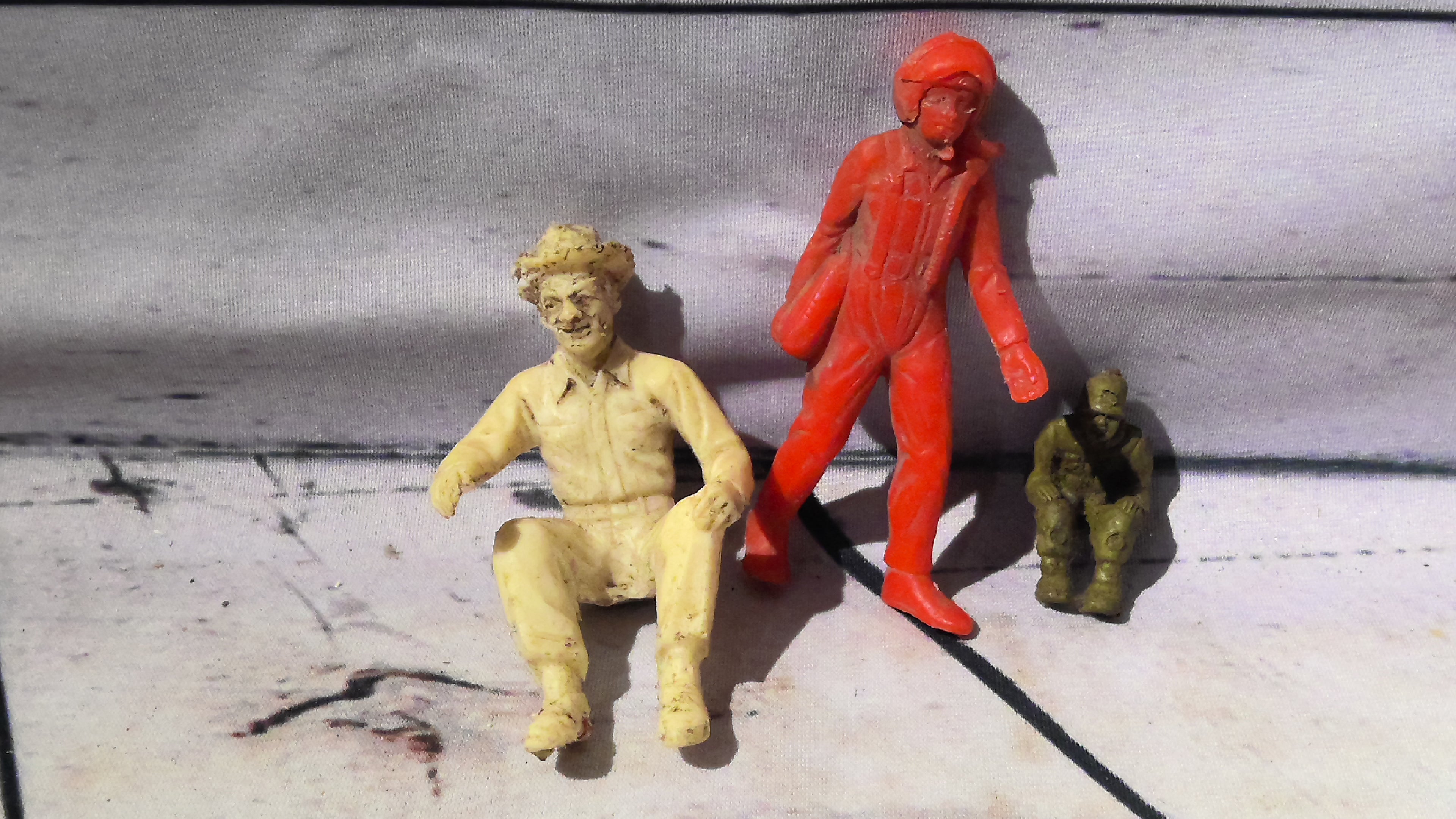 Antique rubber toy people