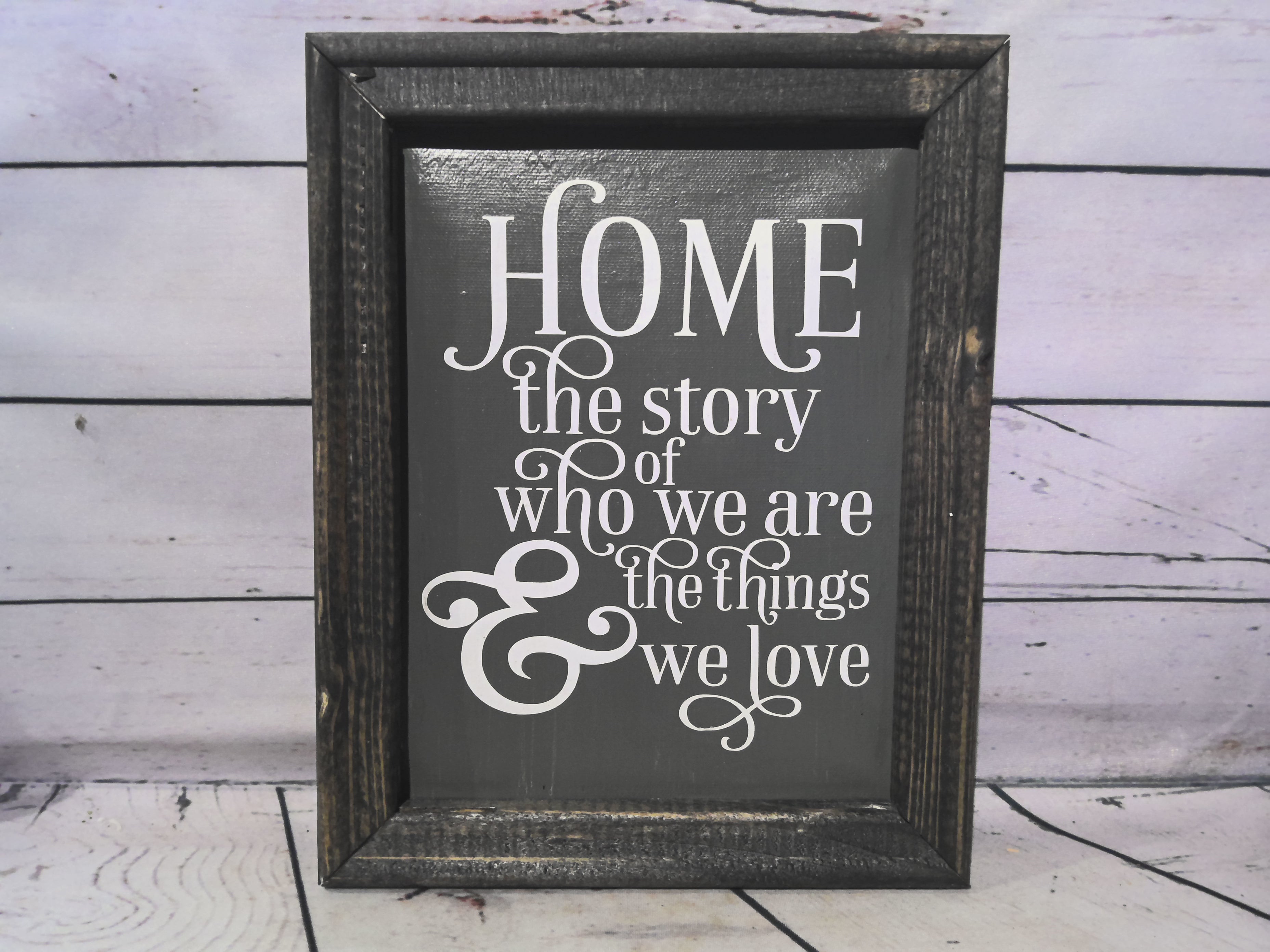 "home the story" sign