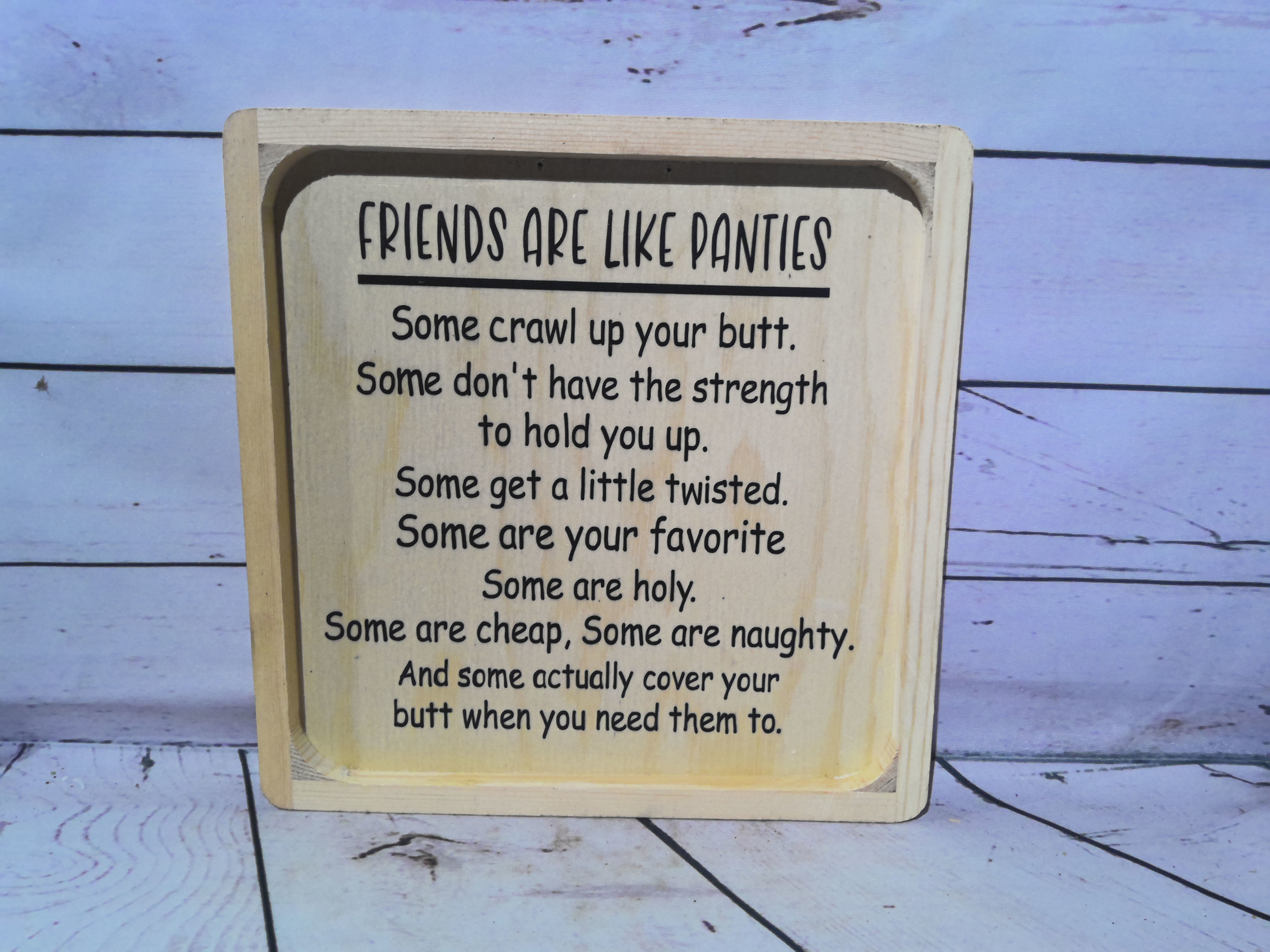 "Friends are like panties" sign
