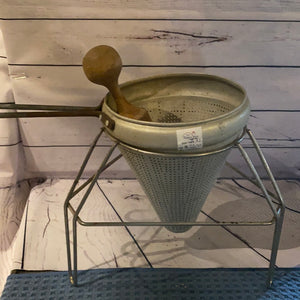 Vintage sifter with pestle