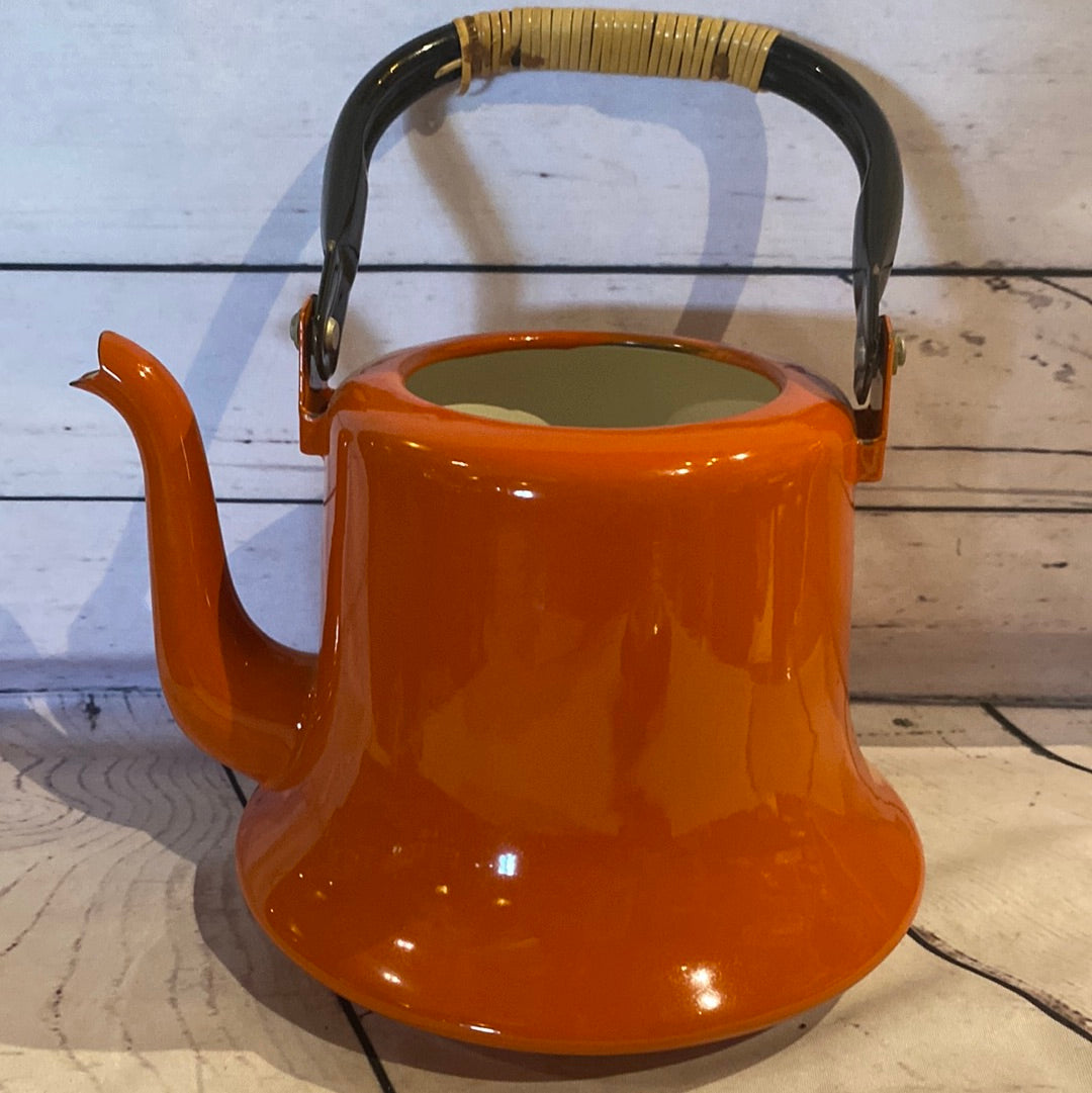 Orange enamel teapot