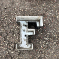Metal “F”