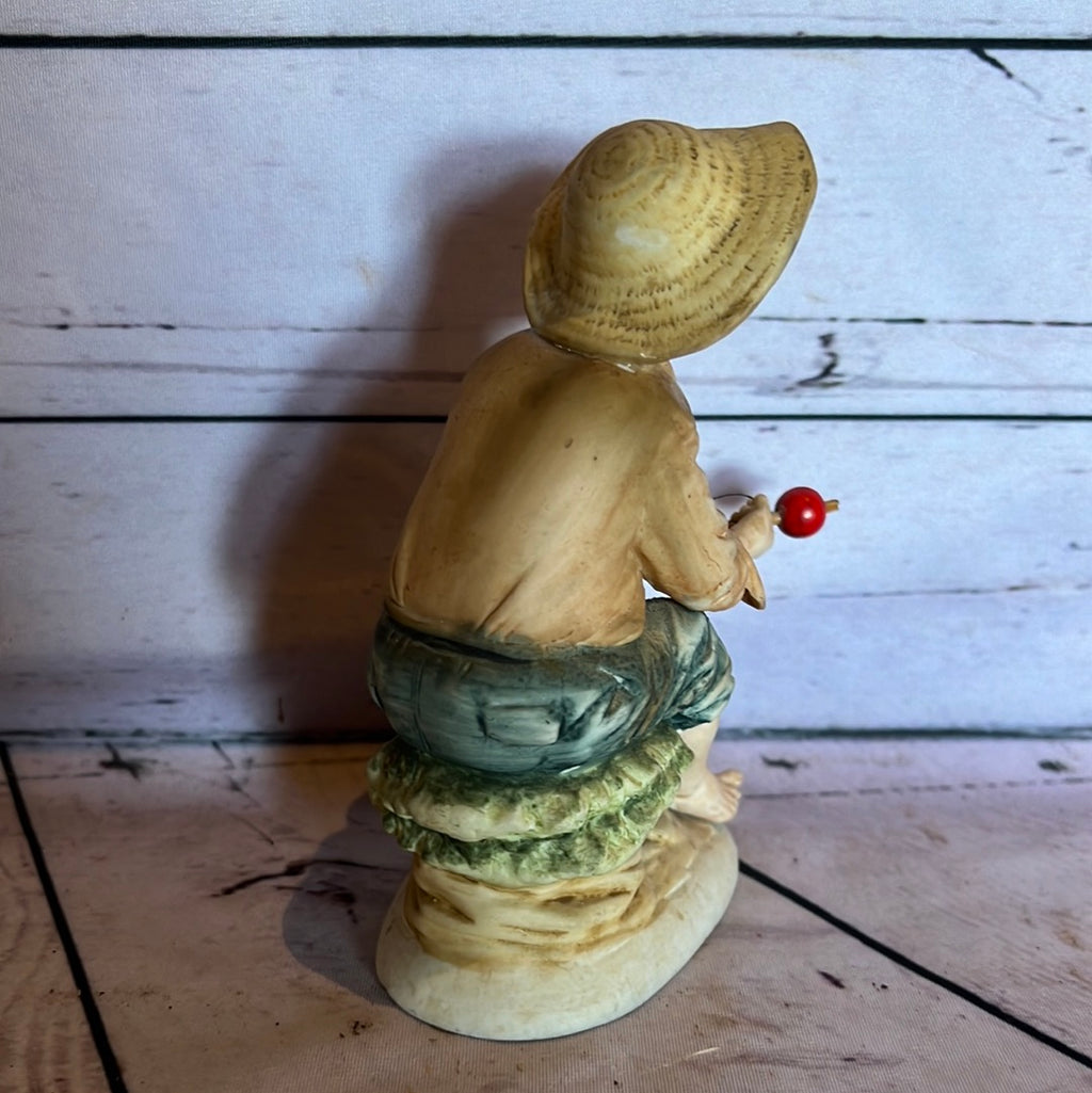 Porcelain boy fishing