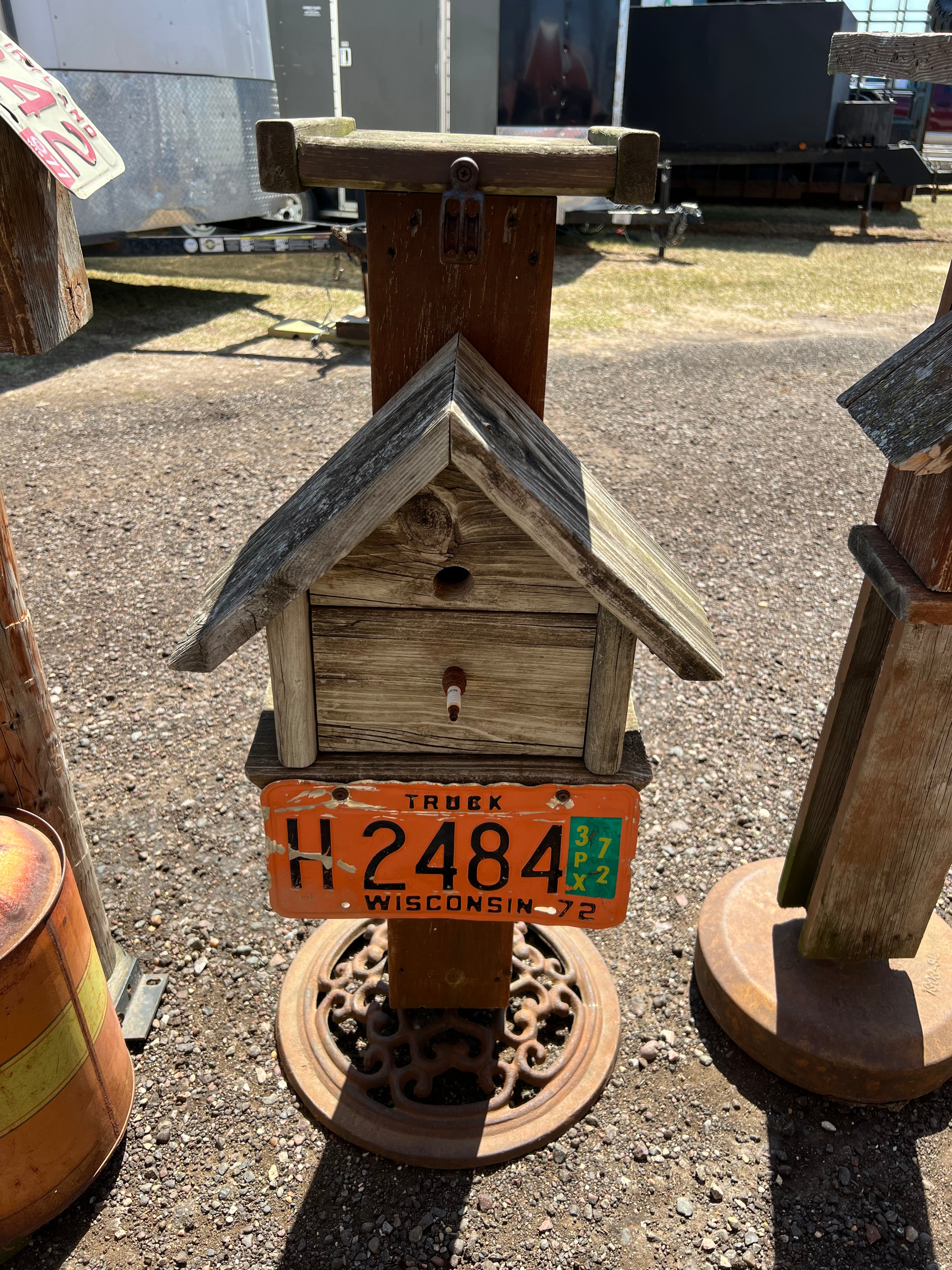Handmade birdhouse with license plate