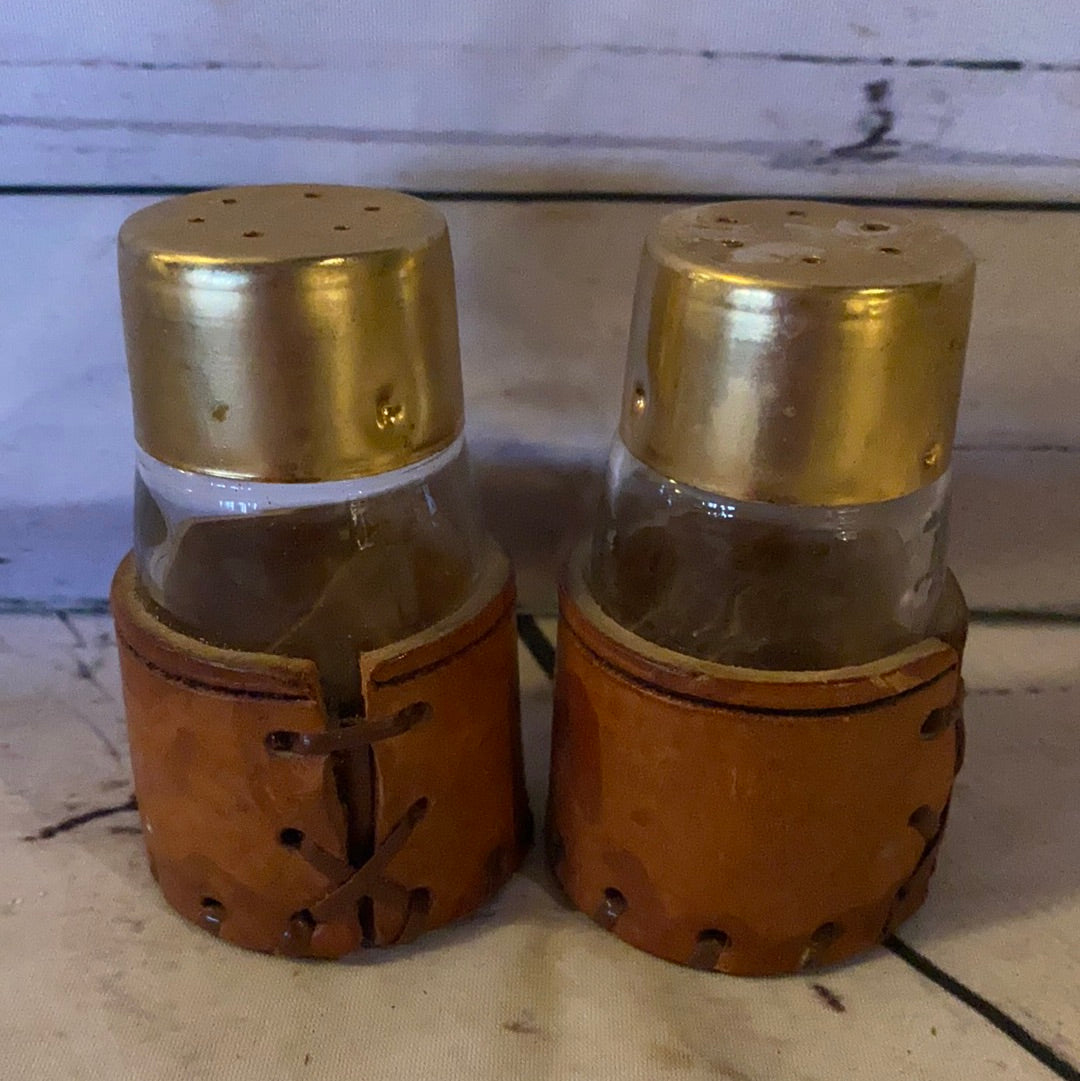 Leather bottom salt and pepper shakers