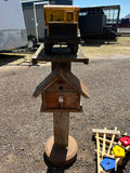 Handmade bird house with truck