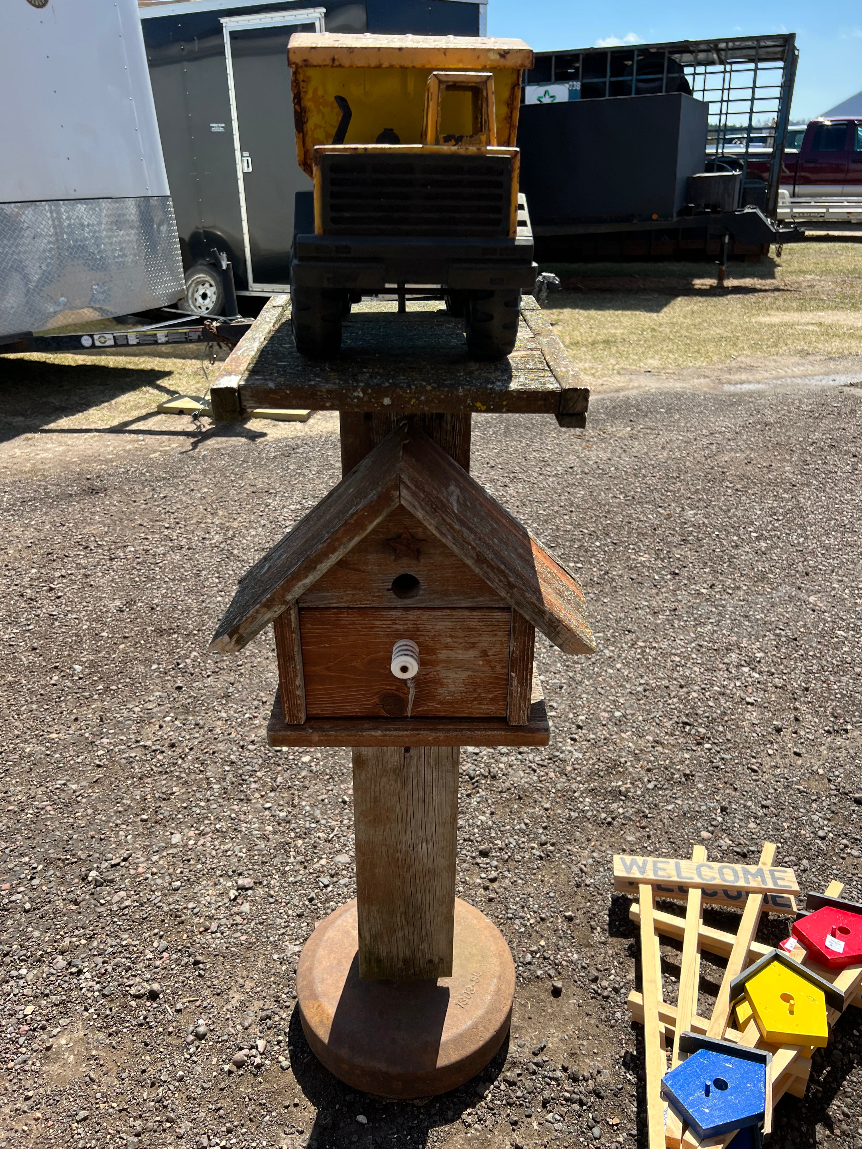 Handmade bird house with truck