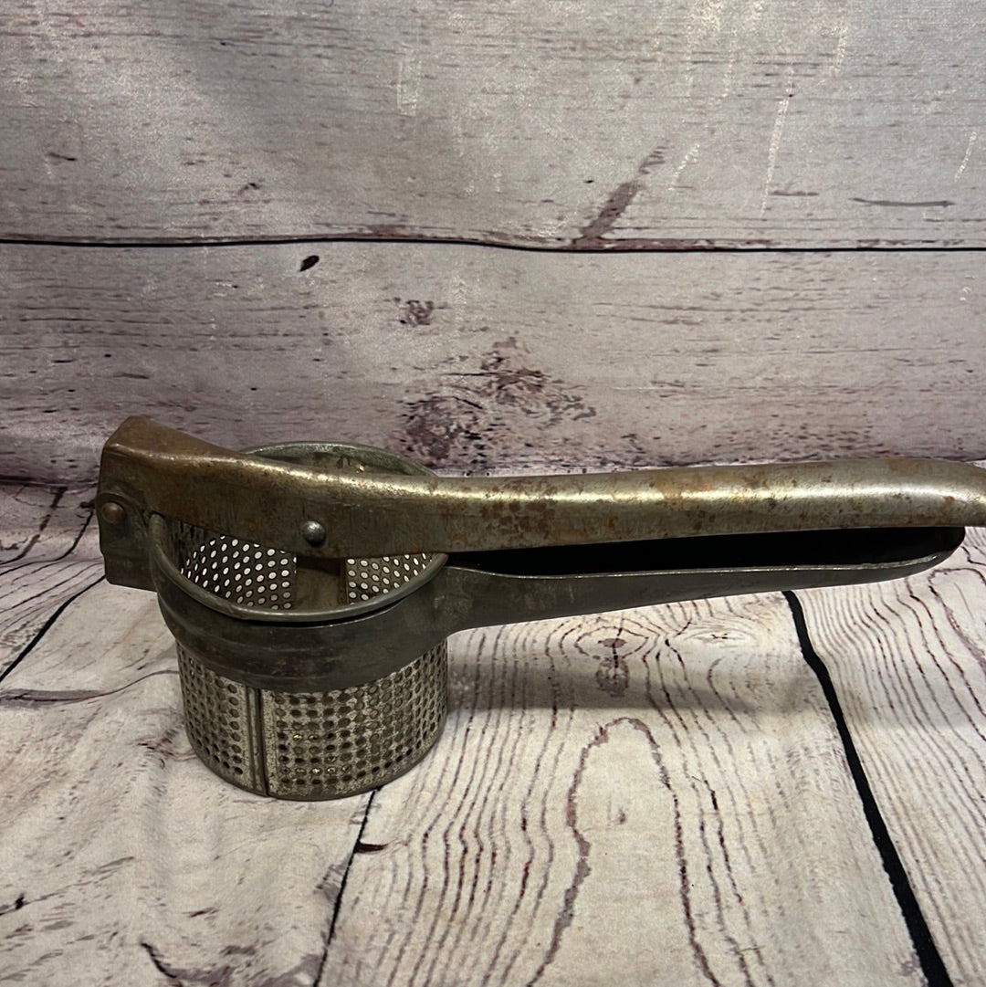 Vintage Bean/potato masher
