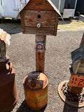 Handmade birdhouse with gas can