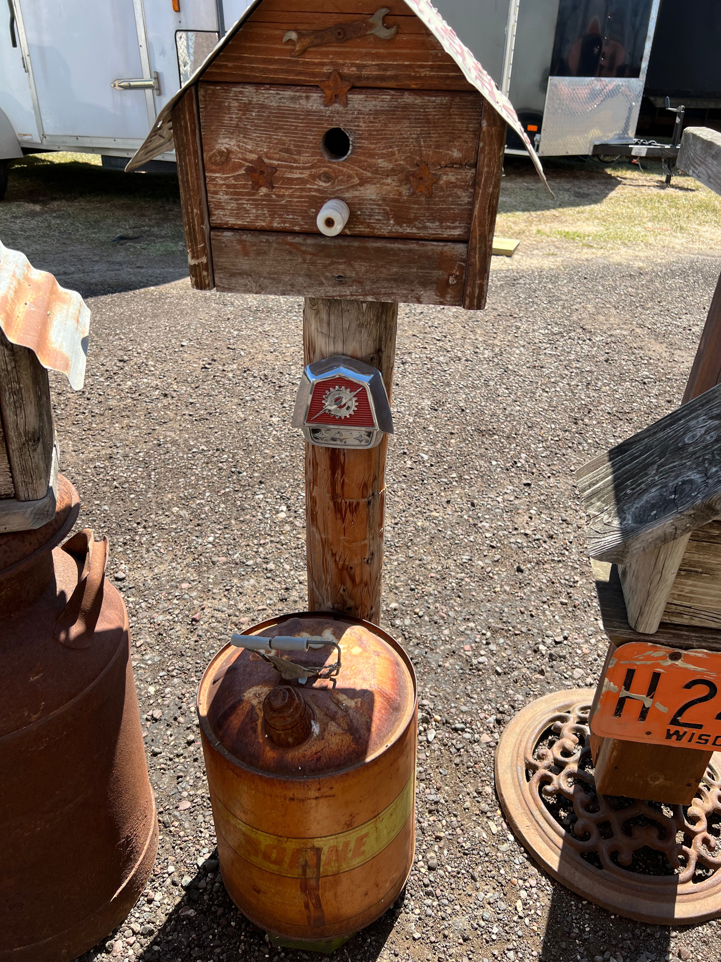 Handmade birdhouse with gas can
