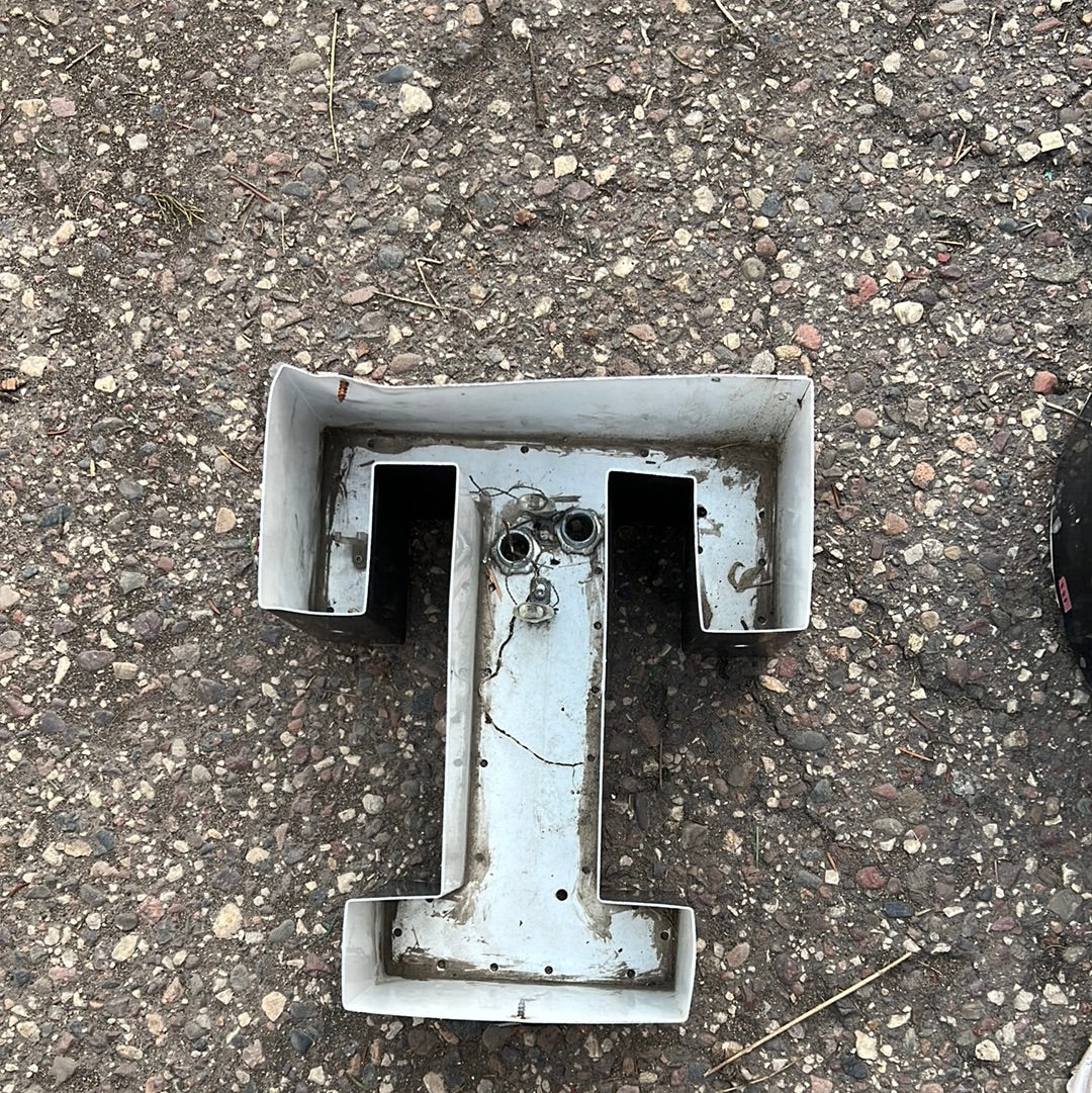 Metal “T”